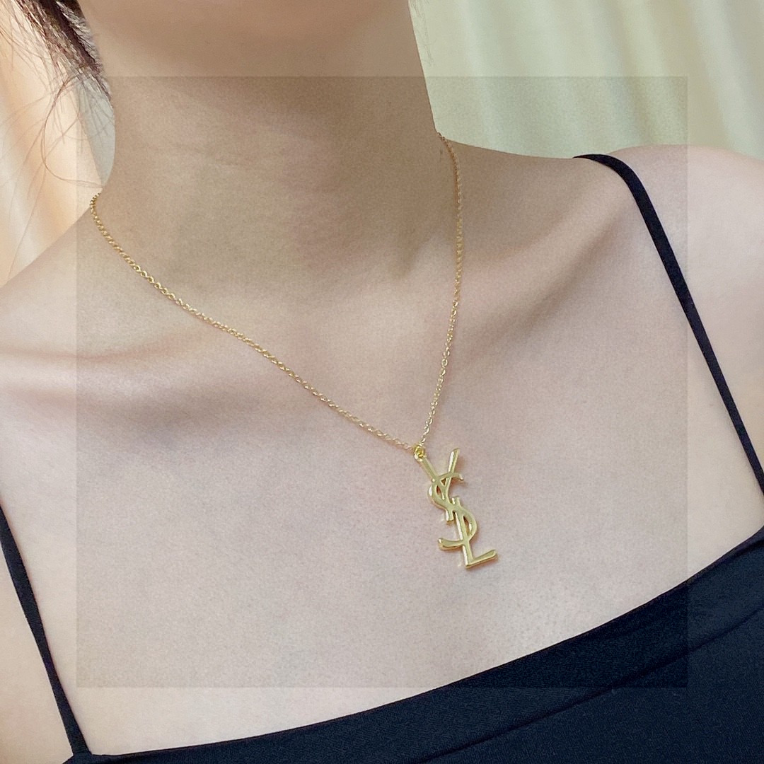Saint Laurent Cassandre YSL Logo Pendant necklace gold-tone metal no accent stones 18 inch