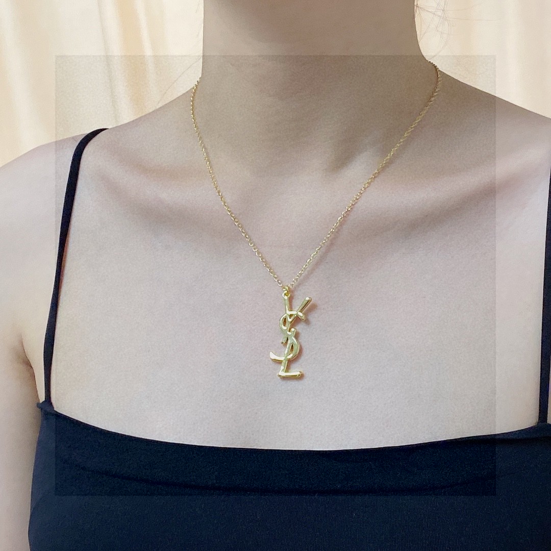 Saint Laurent Cassandre YSL Logo Pendant necklace gold-tone metal no accent stones 18 inch
