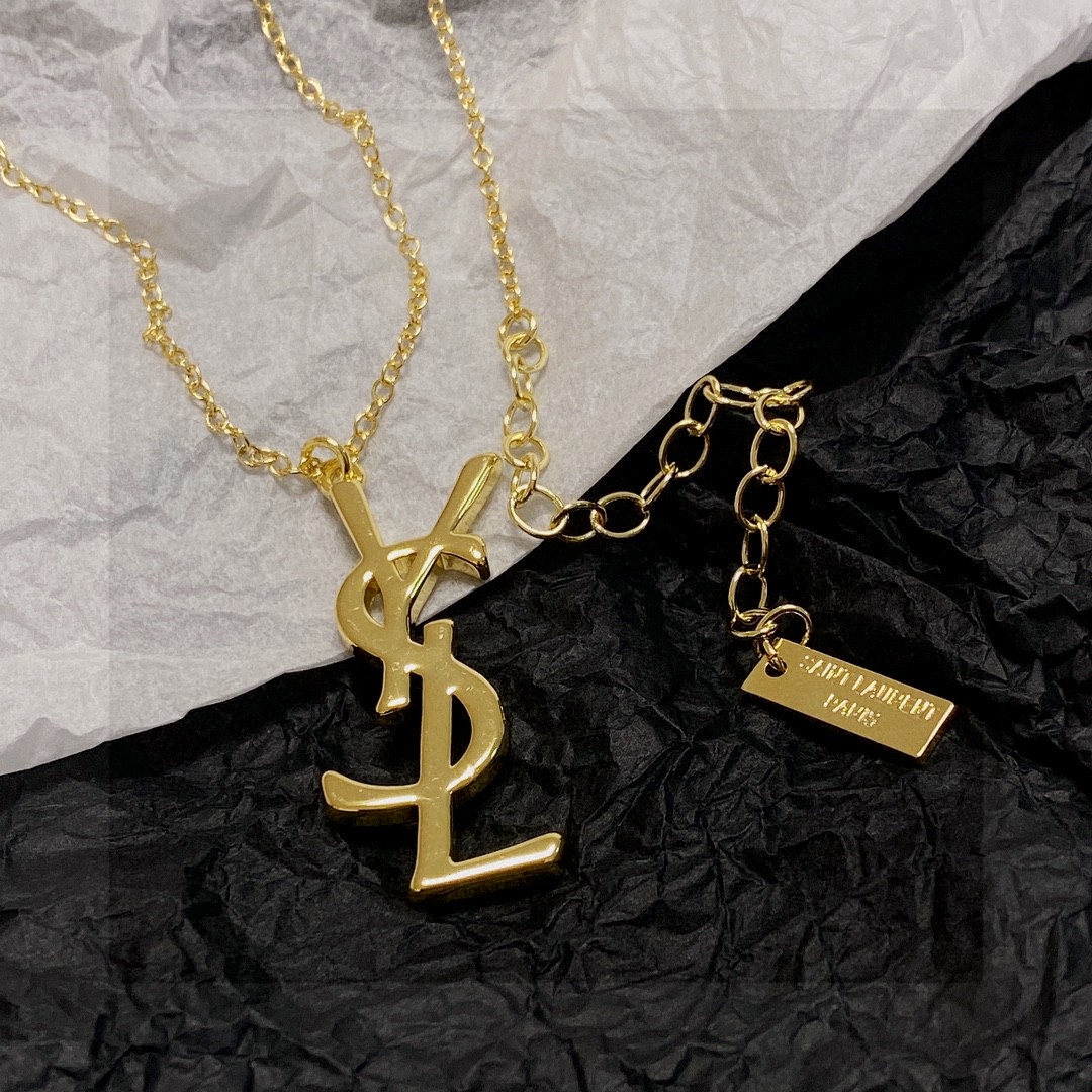Saint Laurent Cassandre YSL Logo Pendant necklace gold-tone metal no accent stones 18 inch