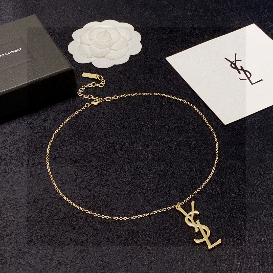Saint Laurent Cassandre YSL Logo Pendant necklace gold-tone metal no accent stones 18 inch