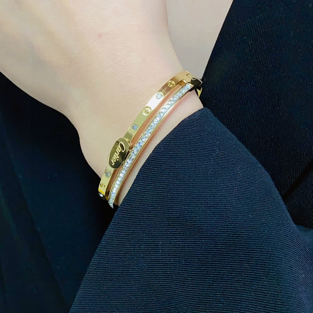 Cartier Love bracelet 18k yellow gold with clear diamond accents 17
