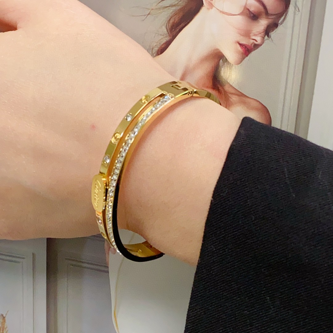Cartier Love bracelet 18k yellow gold with clear diamond accents 17