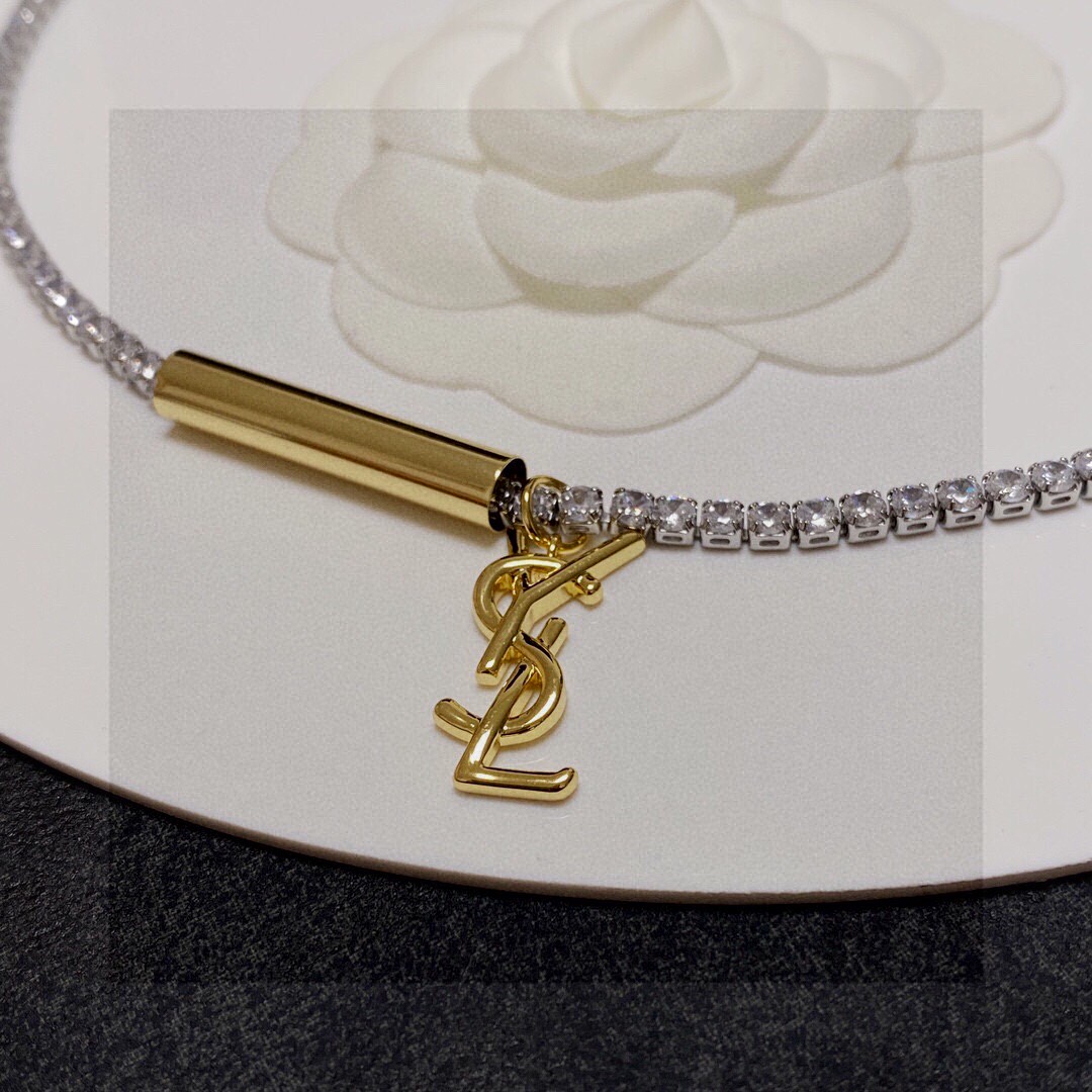 Saint Laurent Cassandre YSL Monogram Crystal Tennis Choker necklace Silver-toned metal with clear faceted crystals gold-toned metal logo and bar charm 40cm with 5cm extender chain