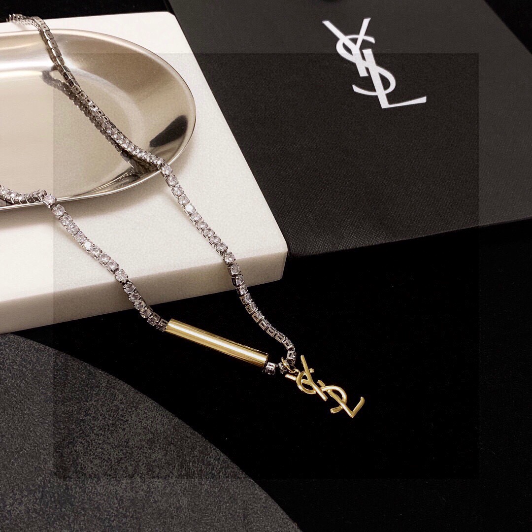 Saint Laurent Cassandre YSL Monogram Crystal Tennis Choker necklace Silver-toned metal with clear faceted crystals gold-toned metal logo and bar charm 40cm with 5cm extender chain