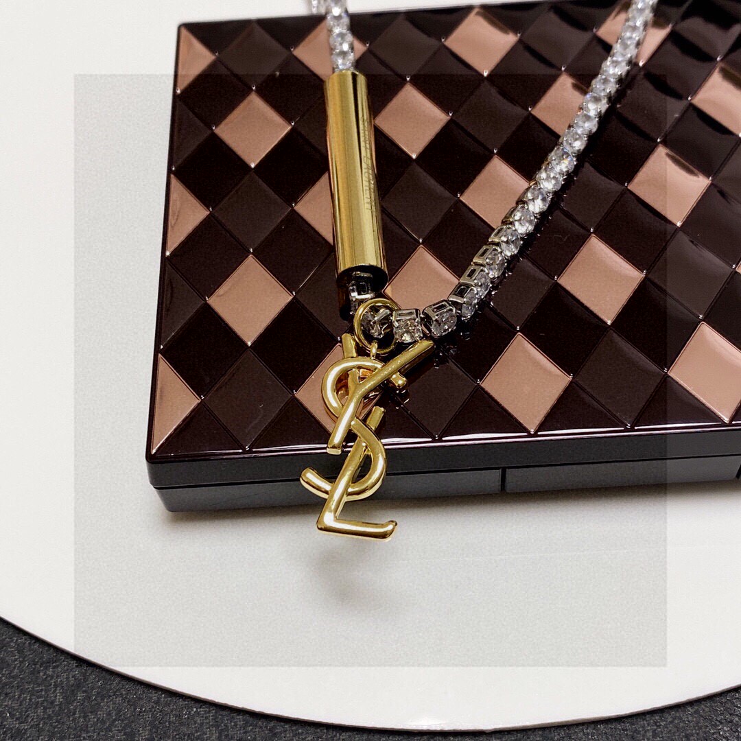 Saint Laurent Cassandre YSL Monogram Crystal Tennis Choker necklace Silver-toned metal with clear faceted crystals gold-toned metal logo and bar charm 40cm with 5cm extender chain