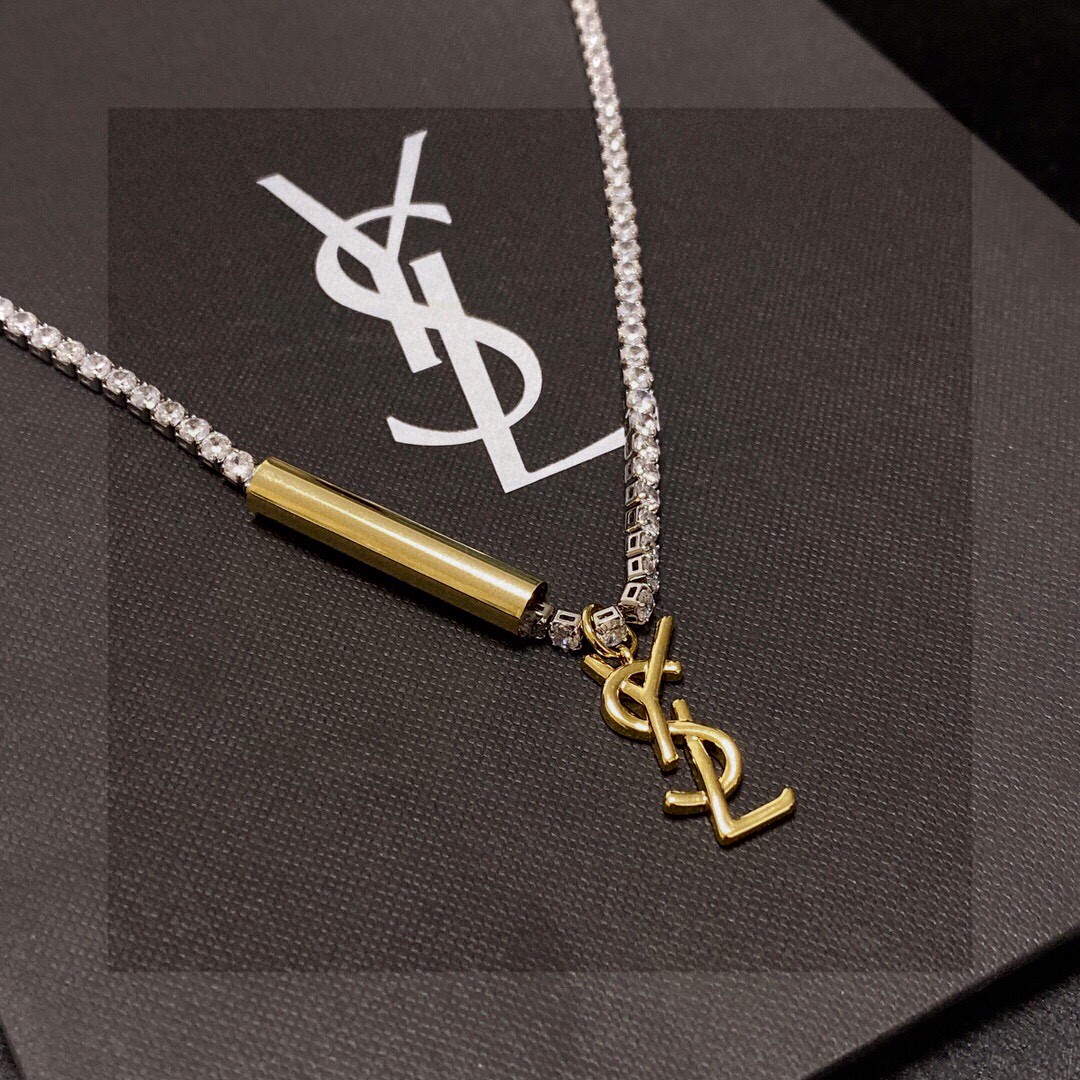 Saint Laurent Cassandre YSL Monogram Crystal Tennis Choker necklace Silver-toned metal with clear faceted crystals gold-toned metal logo and bar charm 40cm with 5cm extender chain