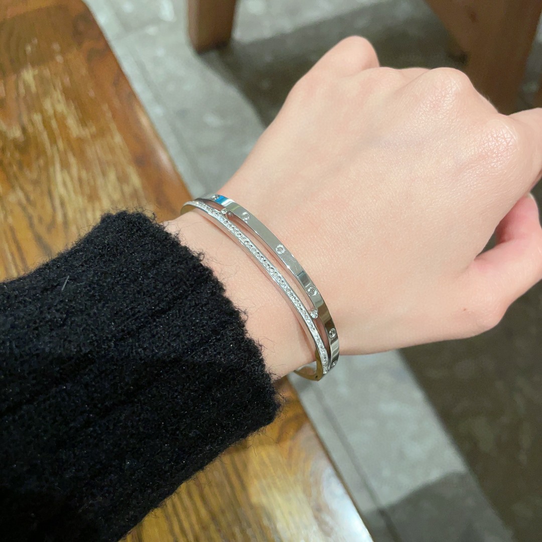 Cartier Love bracelet silver-toned metal with clear pave diamonds 17