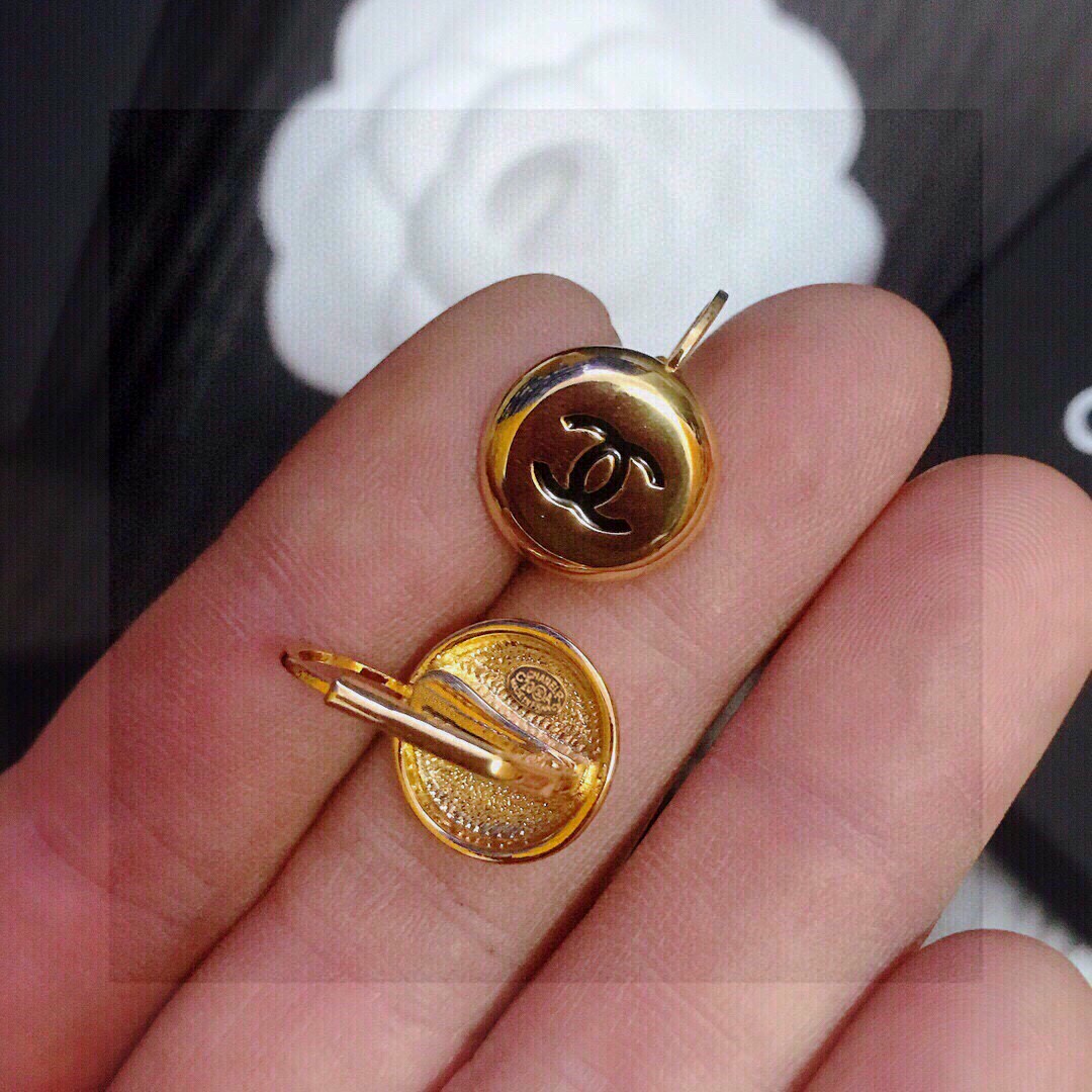 Chanel CC Logo Round Button Stud Earrings earrings gold-tone metal with black enamel CC logo 1 2cm diameter