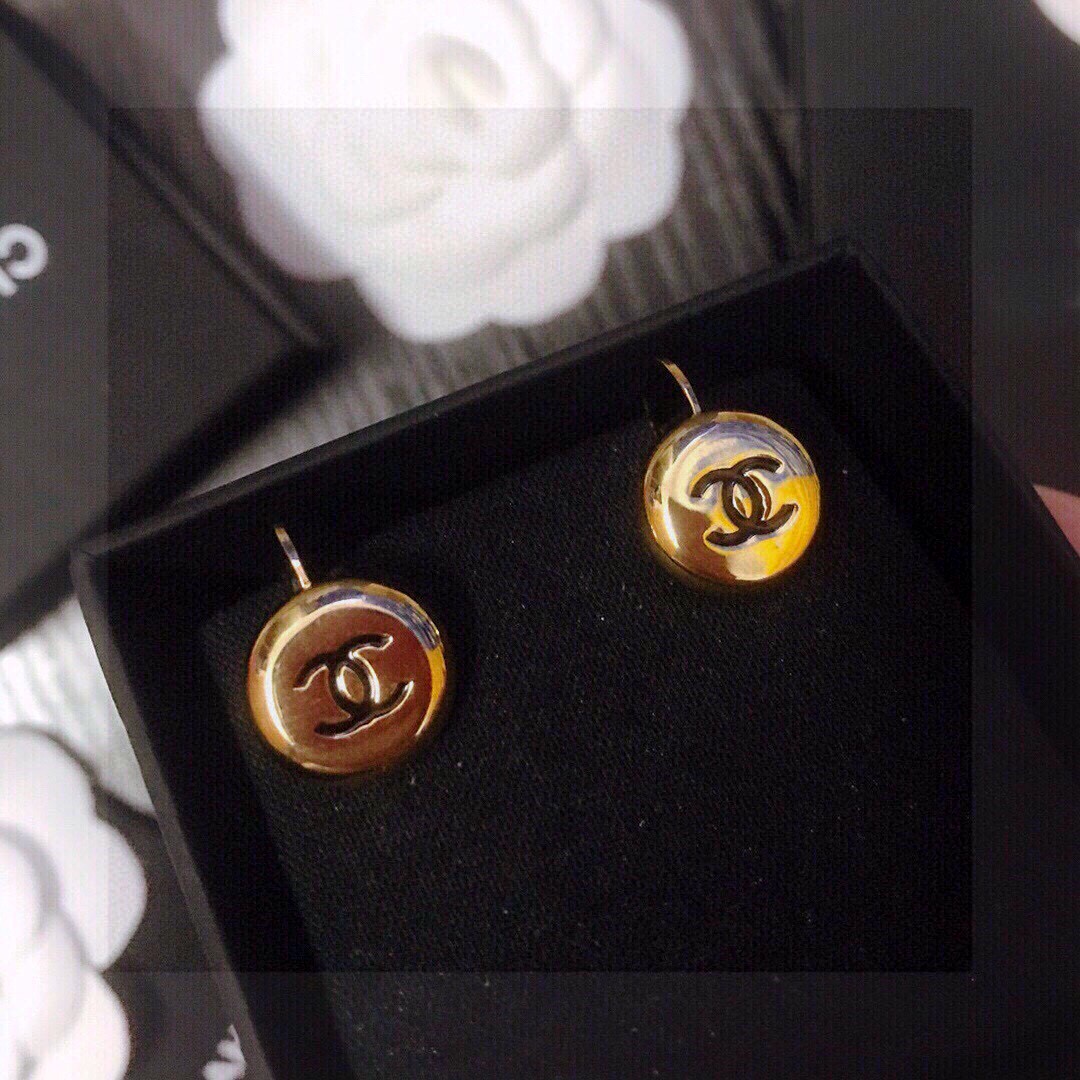 Chanel CC Logo Round Button Stud Earrings earrings gold-tone metal with black enamel CC logo 1 2cm diameter