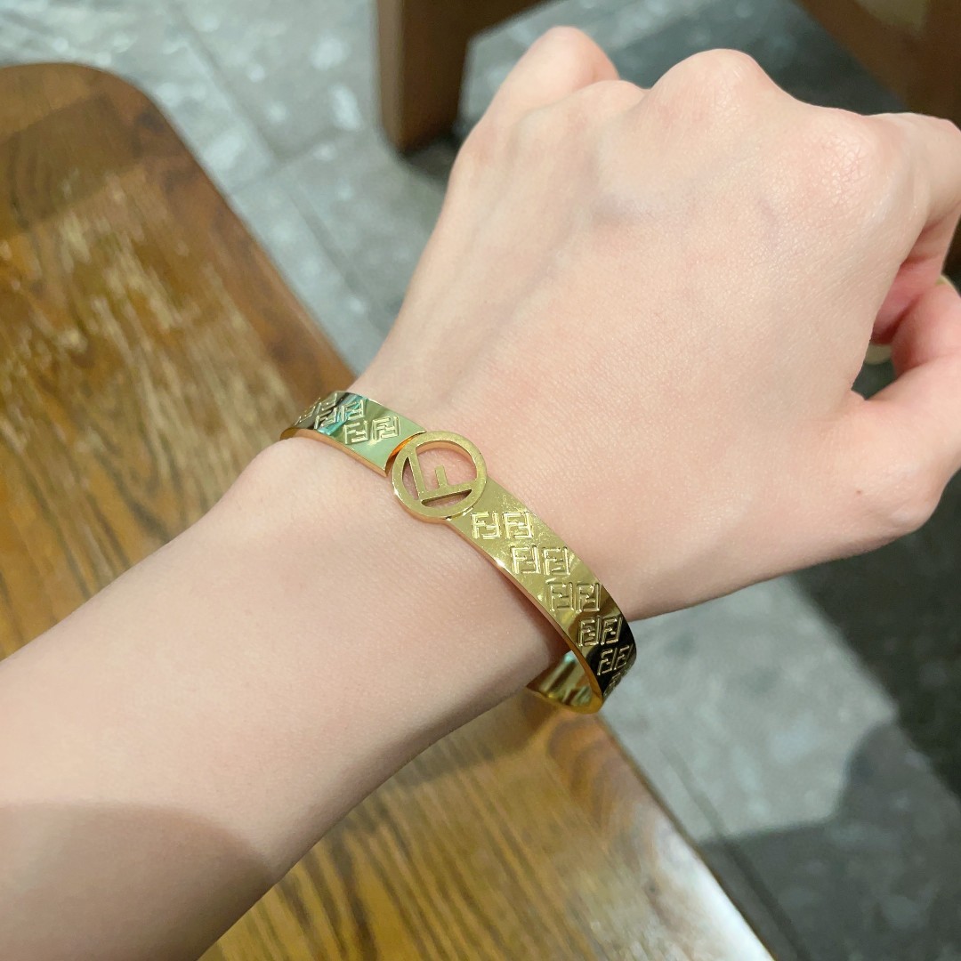 Fendi F is Fendi FF Monogram Bangle bracelet gold-tone metal no additional gemstones 17cm inner circumference