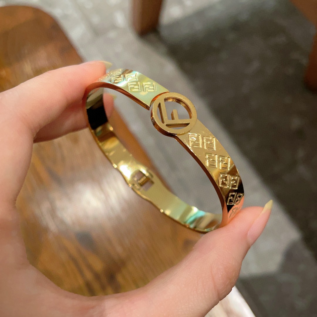 Fendi F is Fendi FF Monogram Bangle bracelet gold-tone metal no additional gemstones 17cm inner circumference