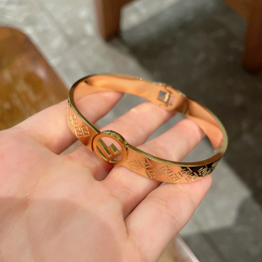 Fendi F is Fendi FF Monogram Bangle bracelet gold-tone metal no additional gemstones 17cm inner circumference