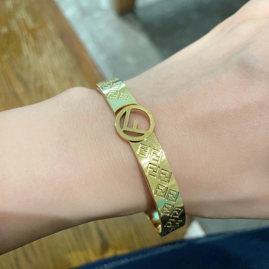 Fendi F is Fendi FF Monogram Bangle bracelet gold-tone metal no additional gemstones 17cm inner circumference