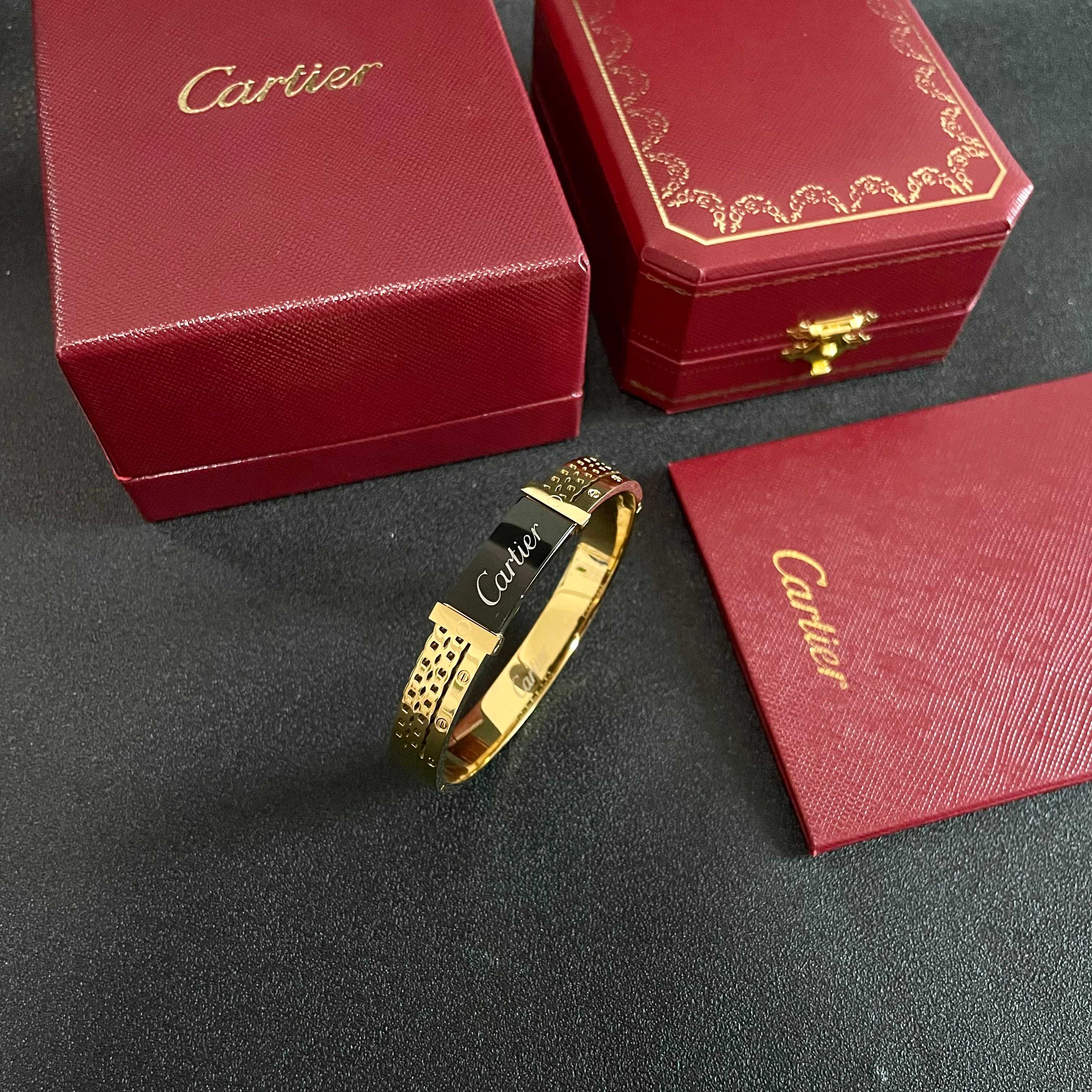 Cartier Logo Signature Bangle bracelet Yellow gold with black enamel 17cm