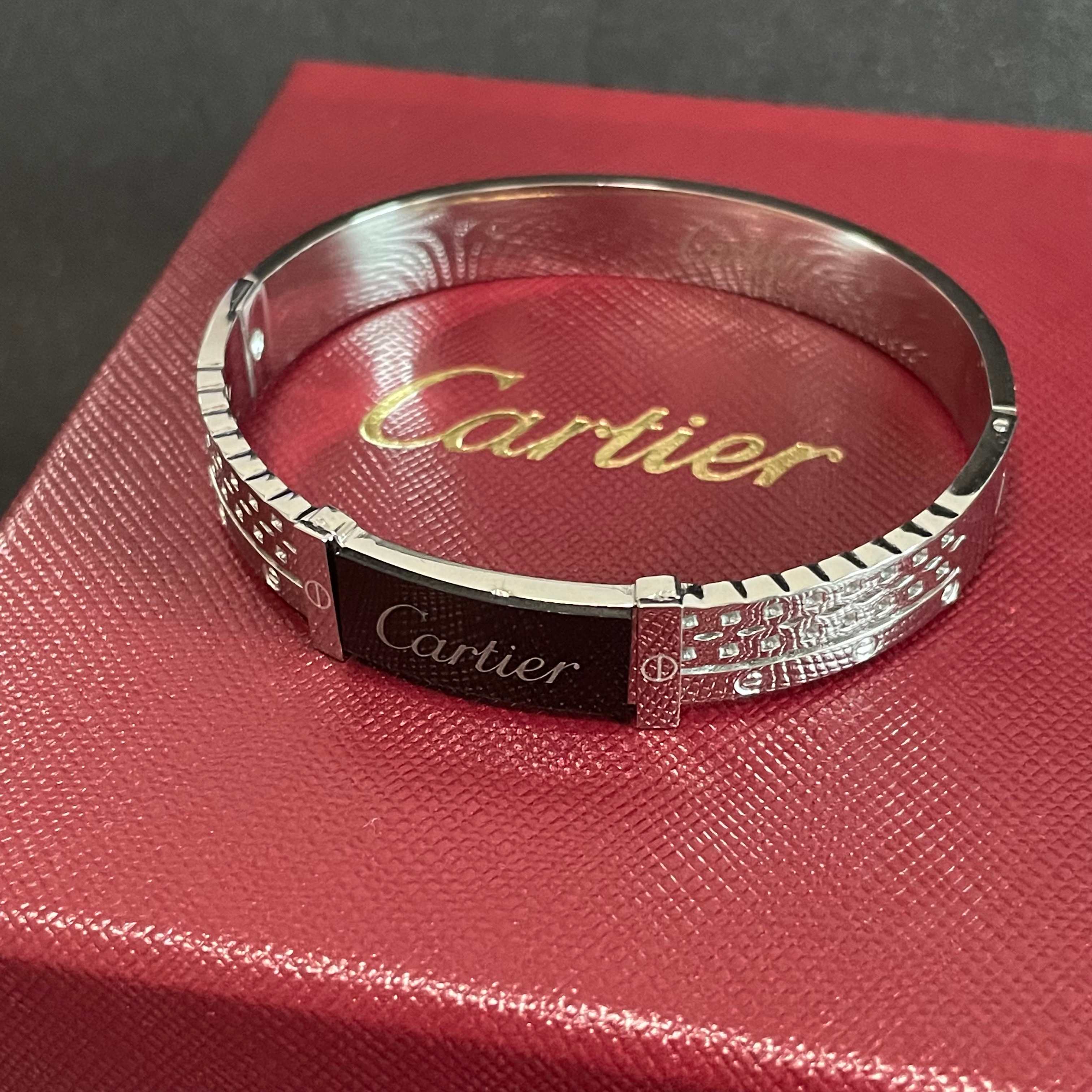 Cartier Logo Studded Bangle bracelet Silver-toned metal with black enamel logo plate 17cm