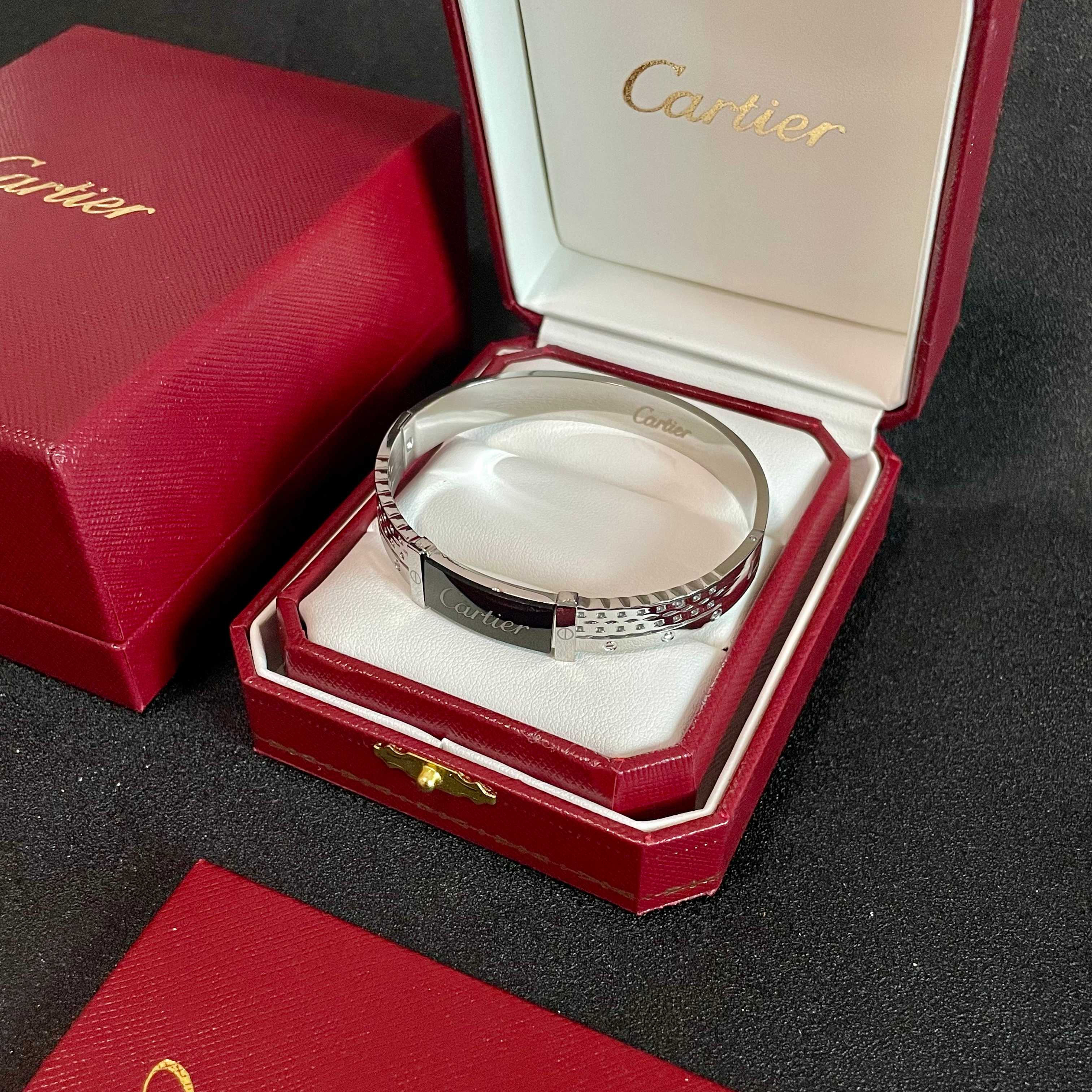 Cartier Logo Studded Bangle bracelet Silver-toned metal with black enamel logo plate 17cm