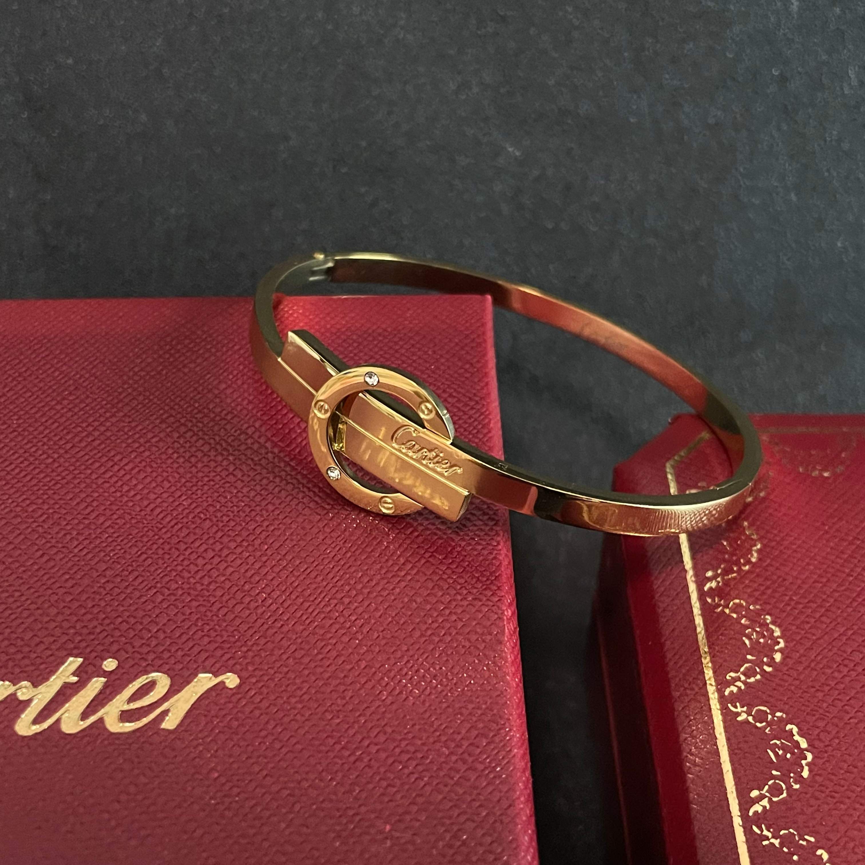 Cartier Love bracelet 18k yellow gold clear diamond accents 17
