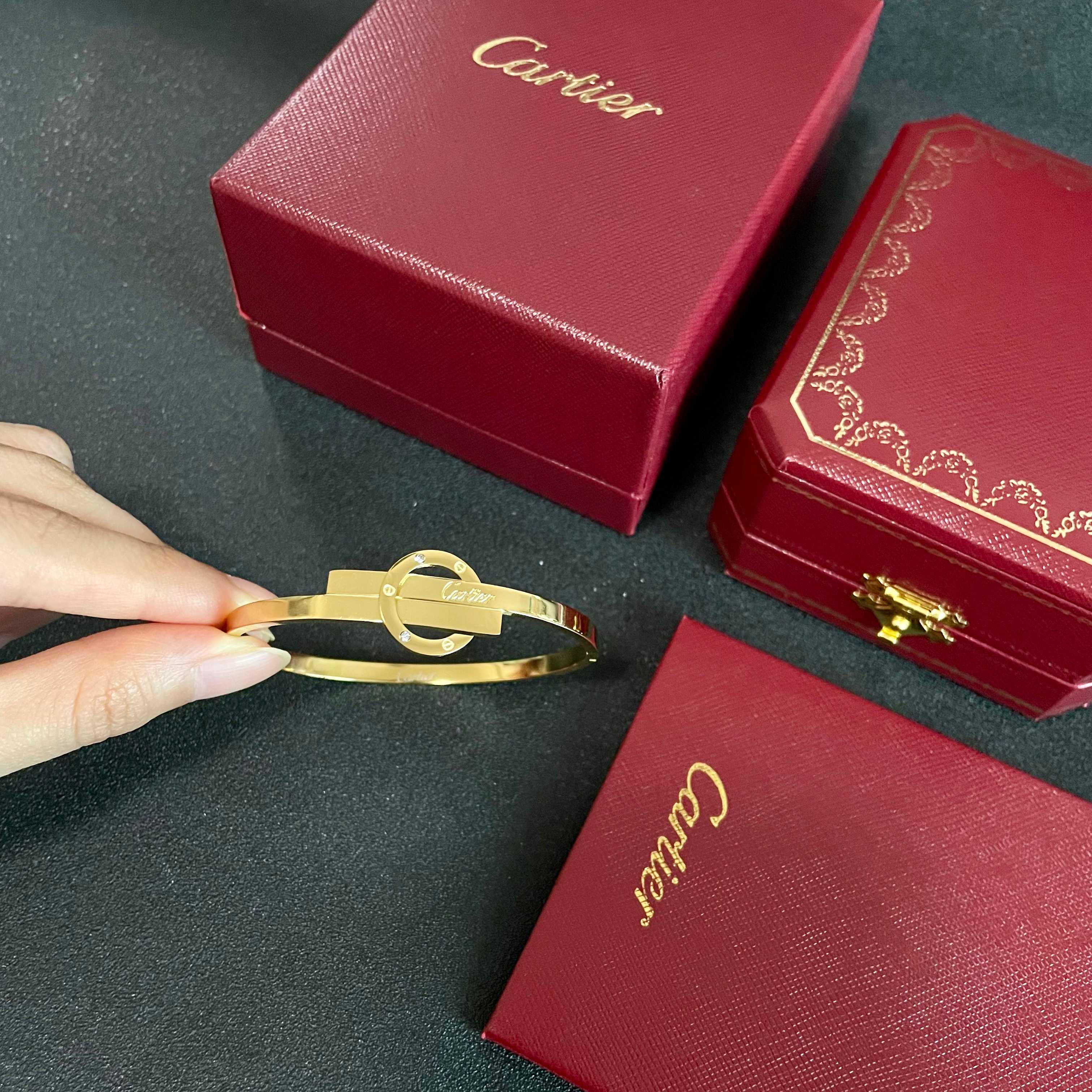 Cartier Love bracelet 18k yellow gold clear diamond accents 17