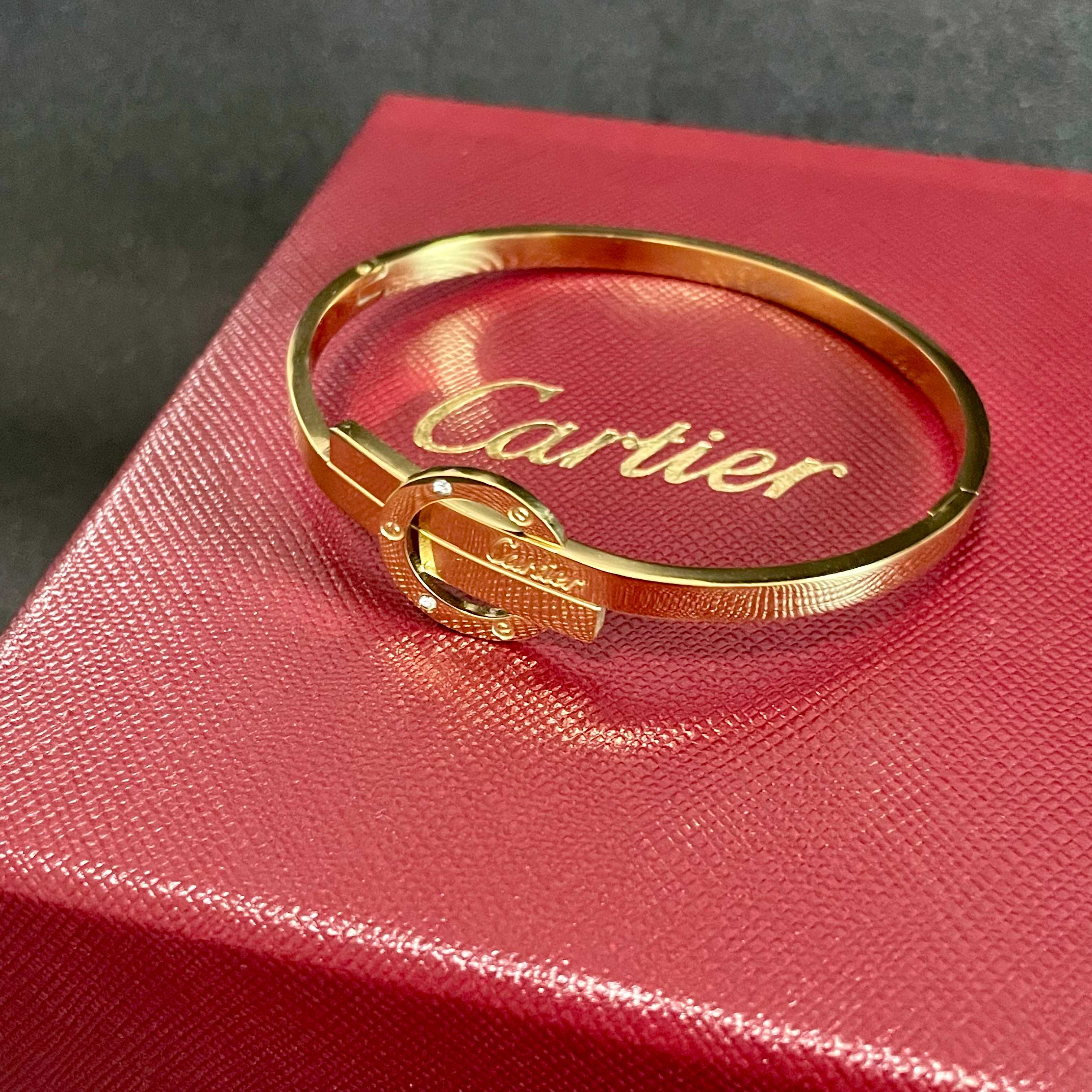 Cartier Love bracelet 18k yellow gold clear diamond accents 17