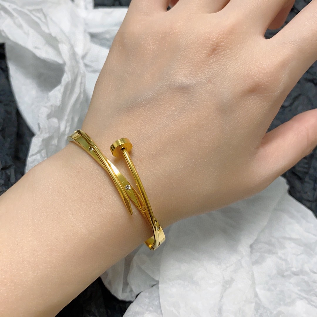 Cartier Juste un Clou bracelet 18k yellow gold with diamond accents 17