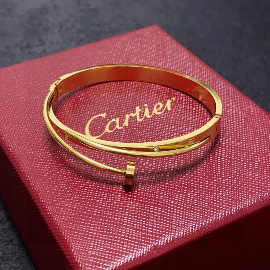 Cartier Juste un Clou bracelet 18k yellow gold with diamond accents 17