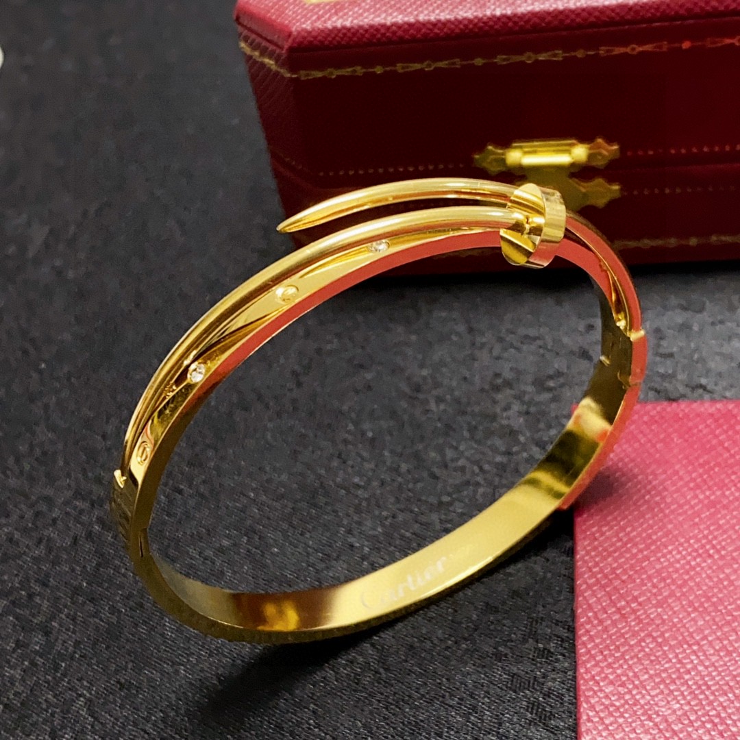 Cartier Juste un Clou bracelet 18k yellow gold with diamond accents 17