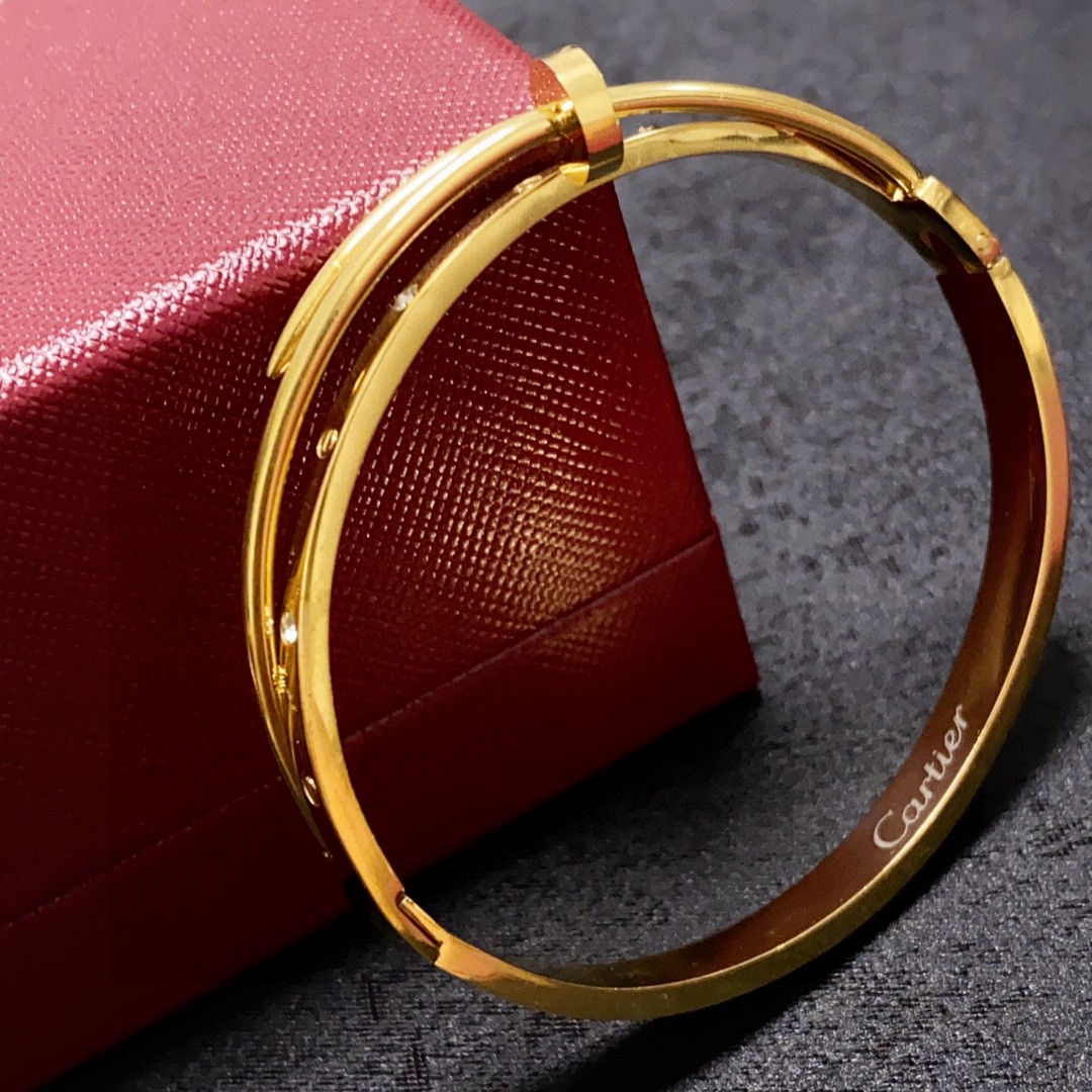 Cartier Juste un Clou bracelet 18k yellow gold with diamond accents 17
