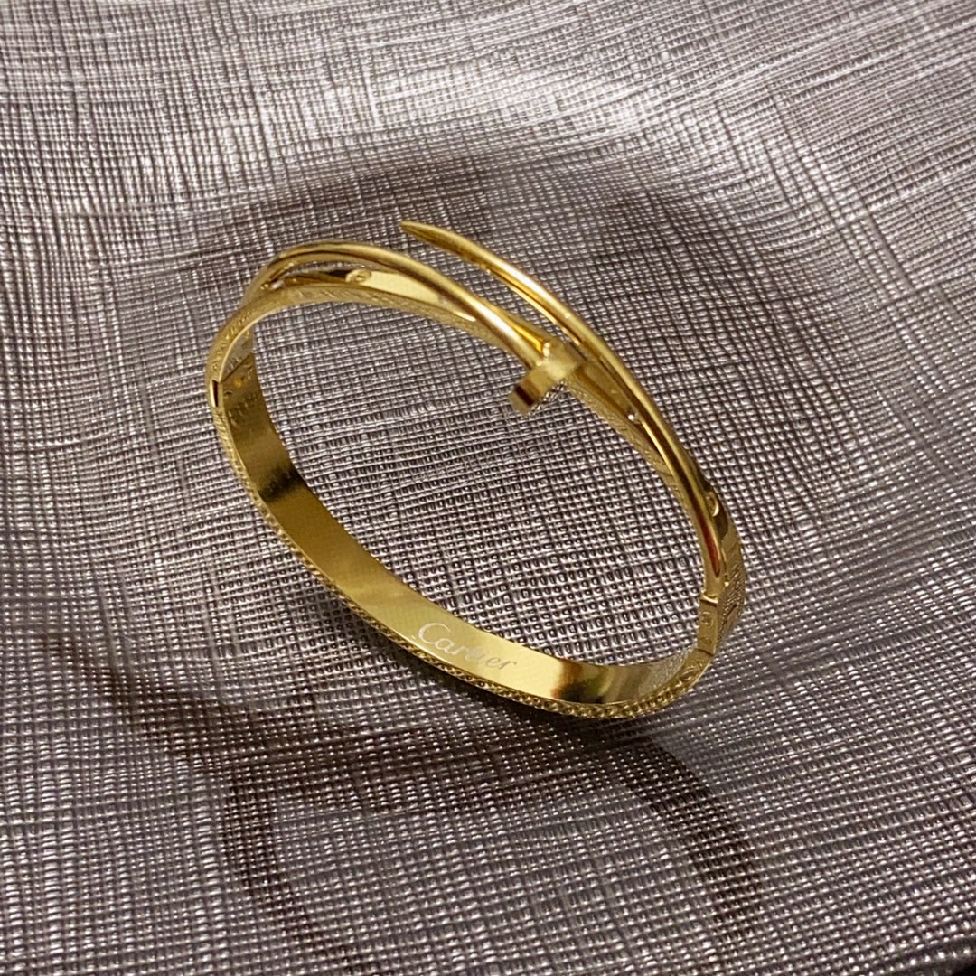 Cartier Juste un Clou bracelet 18k yellow gold with diamond accents 17