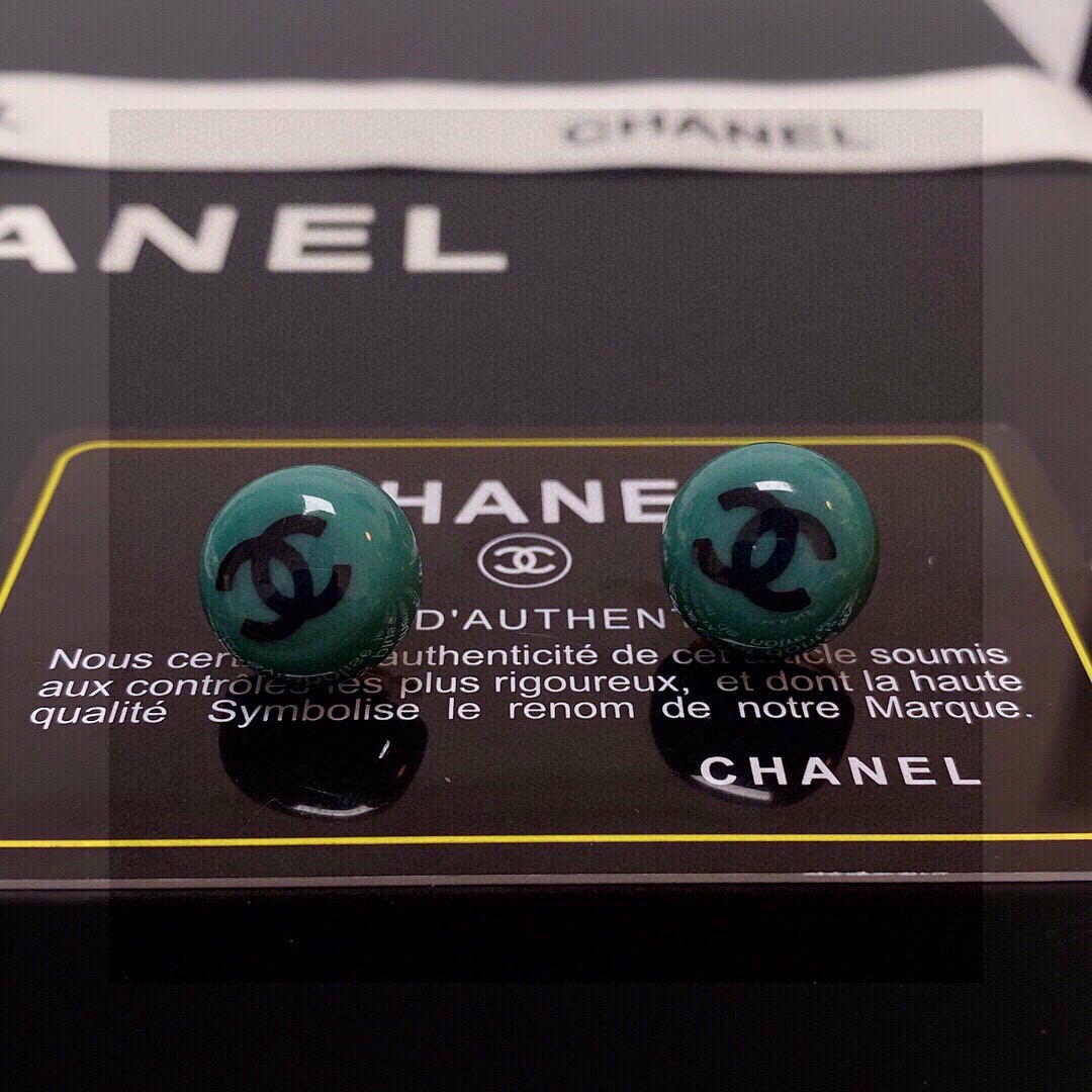 Chanel CC Logo Resin Ball Stud Earrings earrings Teal green resin with black interlocking CC logo gold-tone metal hardware 10mm diameter
