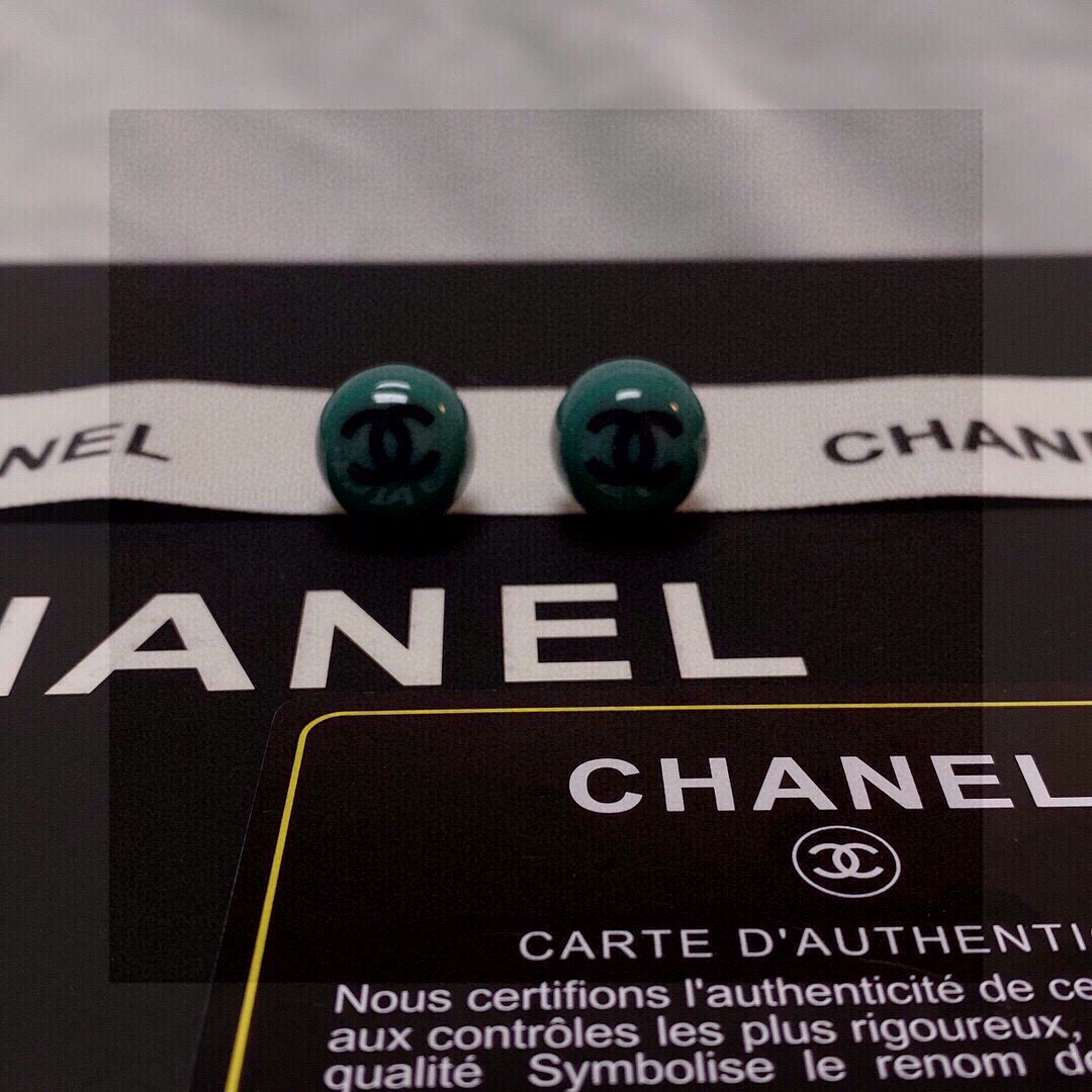Chanel CC Logo Resin Ball Stud Earrings earrings Teal green resin with black interlocking CC logo gold-tone metal hardware 10mm diameter