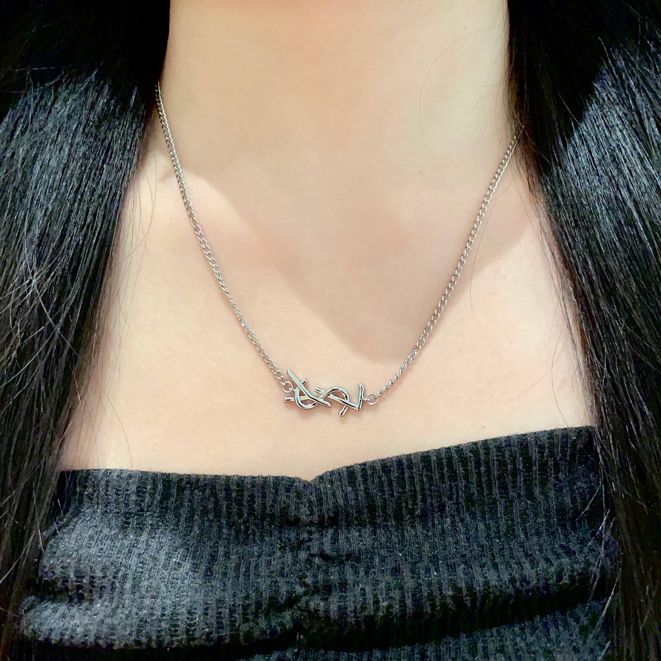 Saint Laurent Cassandre Monogram necklace silver metal 40cm