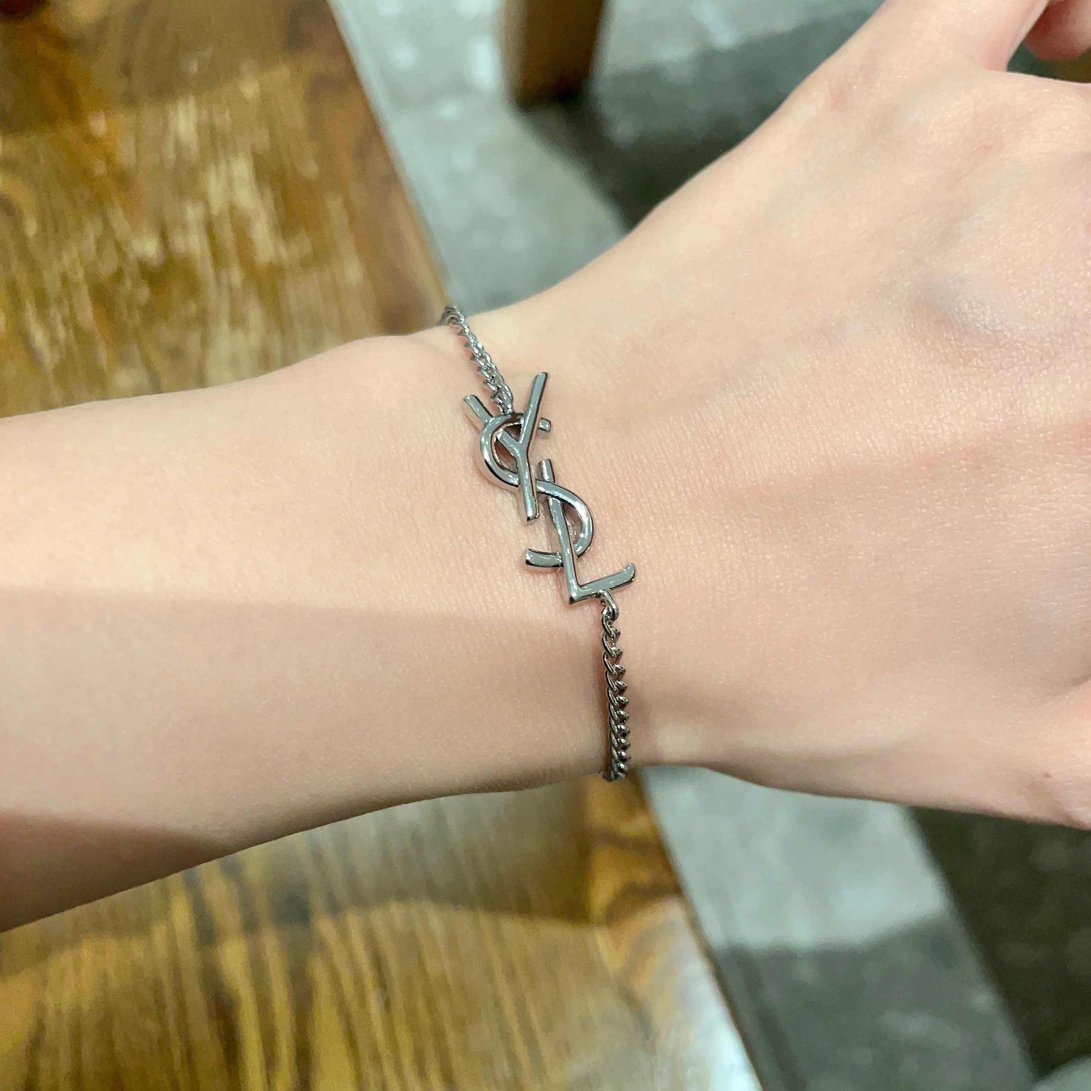 Saint Laurent Cassandre YSL Monogram bracelet silver-toned metal no gemstones 18cm with 3cm extender