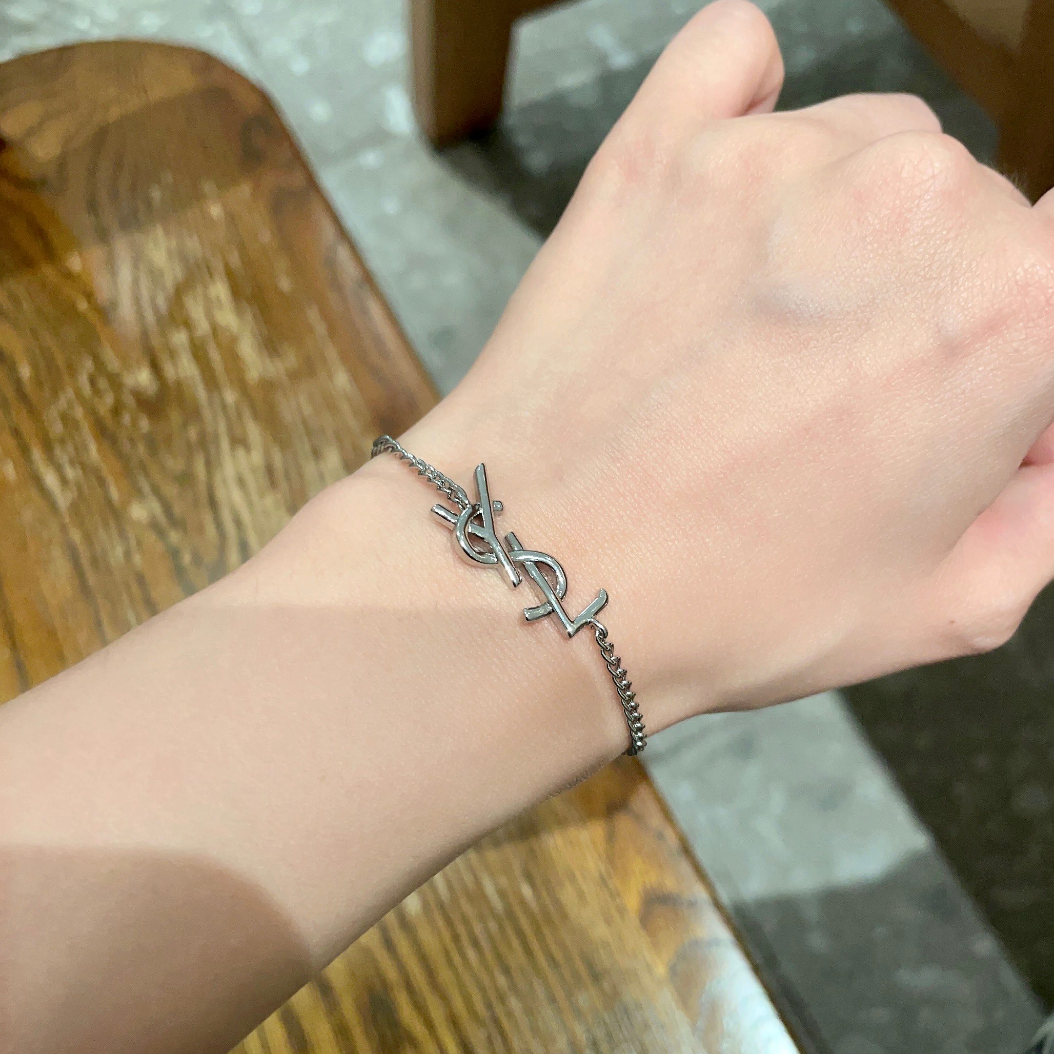 Saint Laurent Cassandre YSL Monogram bracelet silver-toned metal no gemstones 18cm with 3cm extender