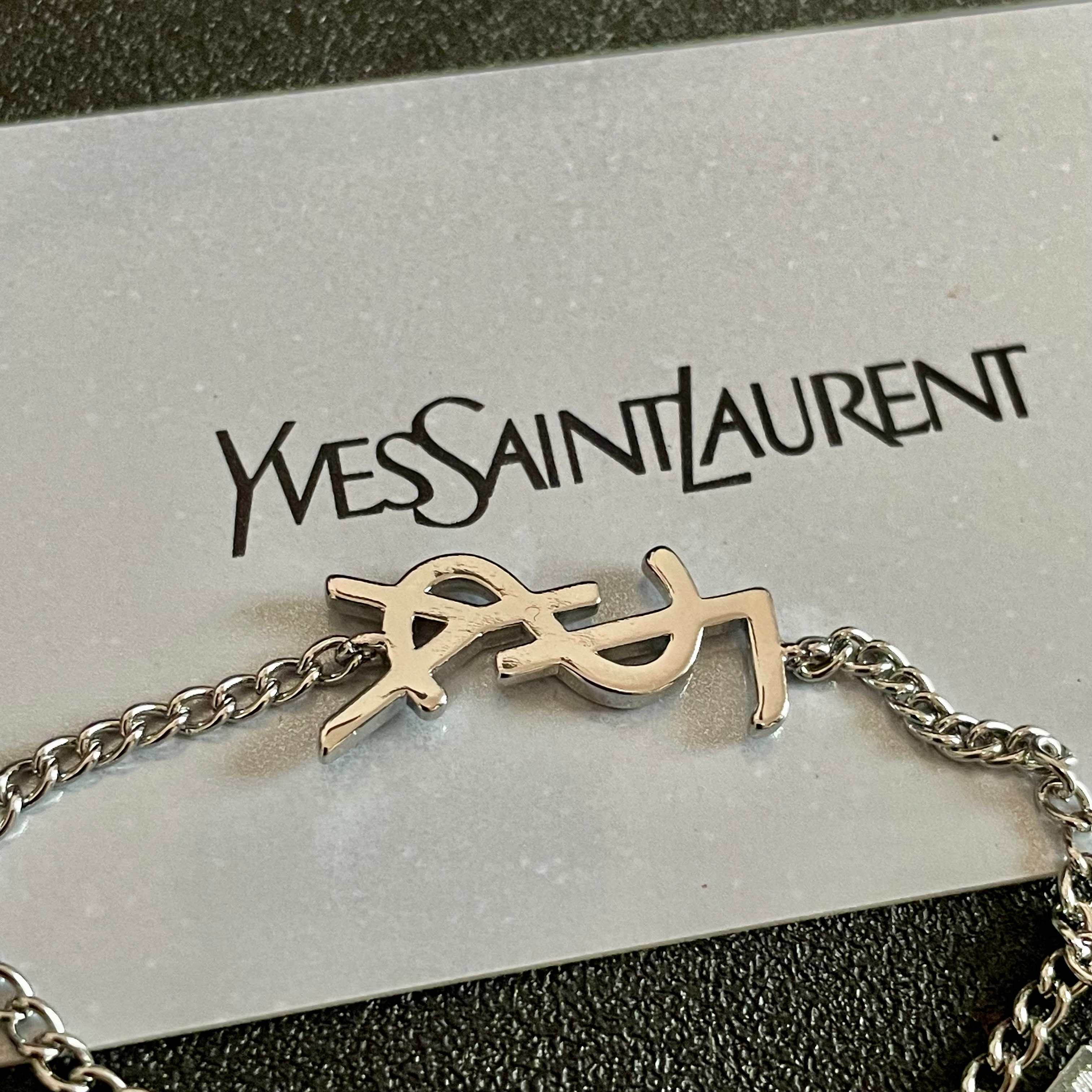 Saint Laurent Cassandre YSL Monogram bracelet silver-toned metal no gemstones 18cm with 3cm extender