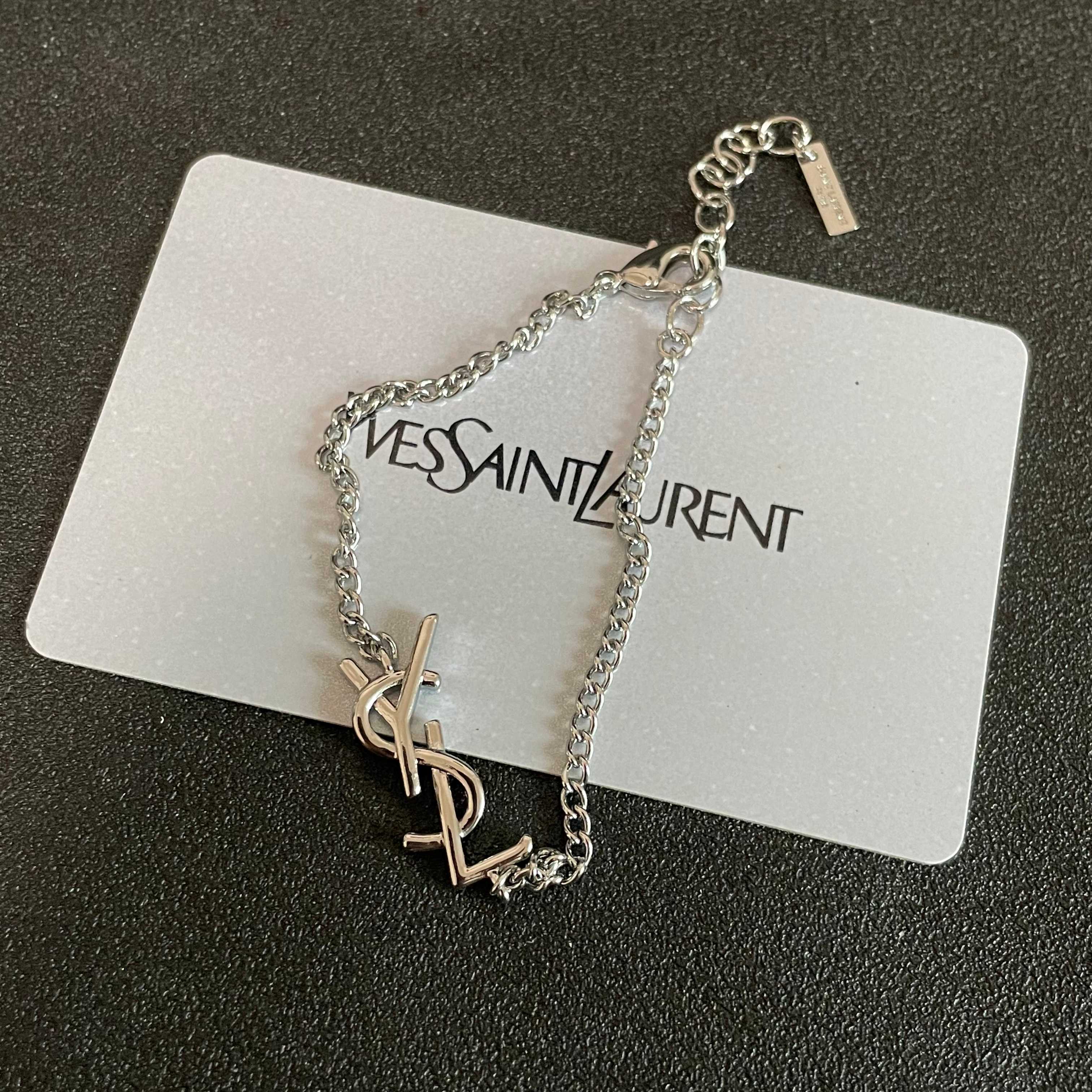Saint Laurent Cassandre YSL Monogram bracelet silver-toned metal no gemstones 18cm with 3cm extender