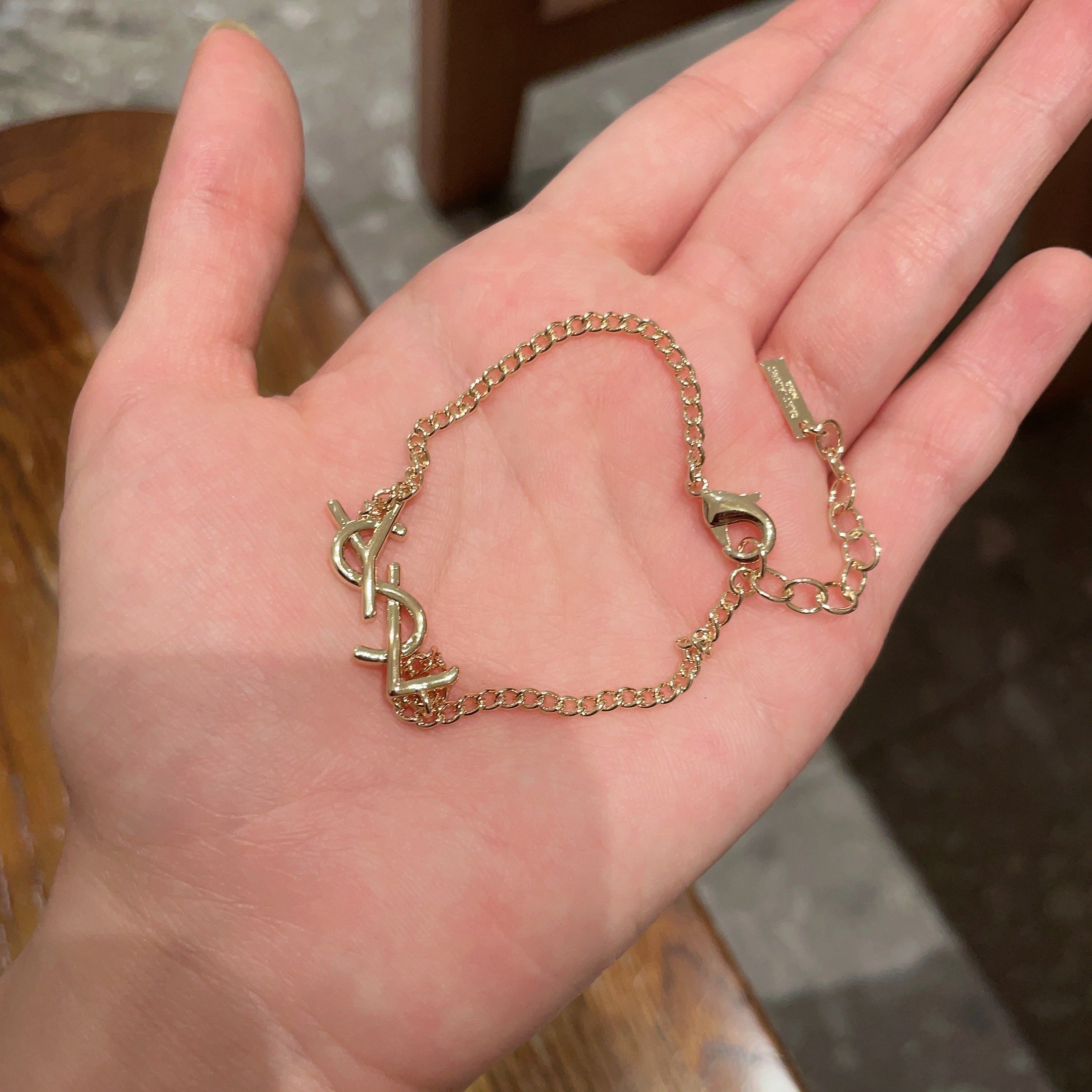 Saint Laurent Cassandre Monogram bracelet gold-tone metal 19cm adjustable