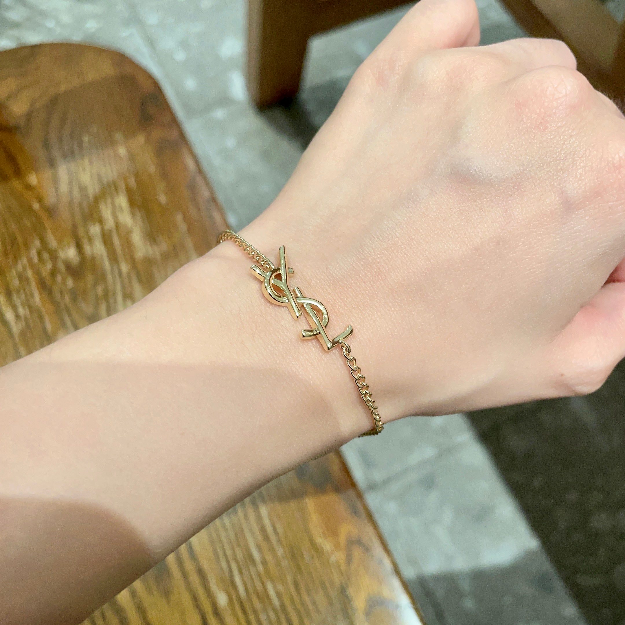 Saint Laurent Cassandre Monogram bracelet gold-tone metal 19cm adjustable