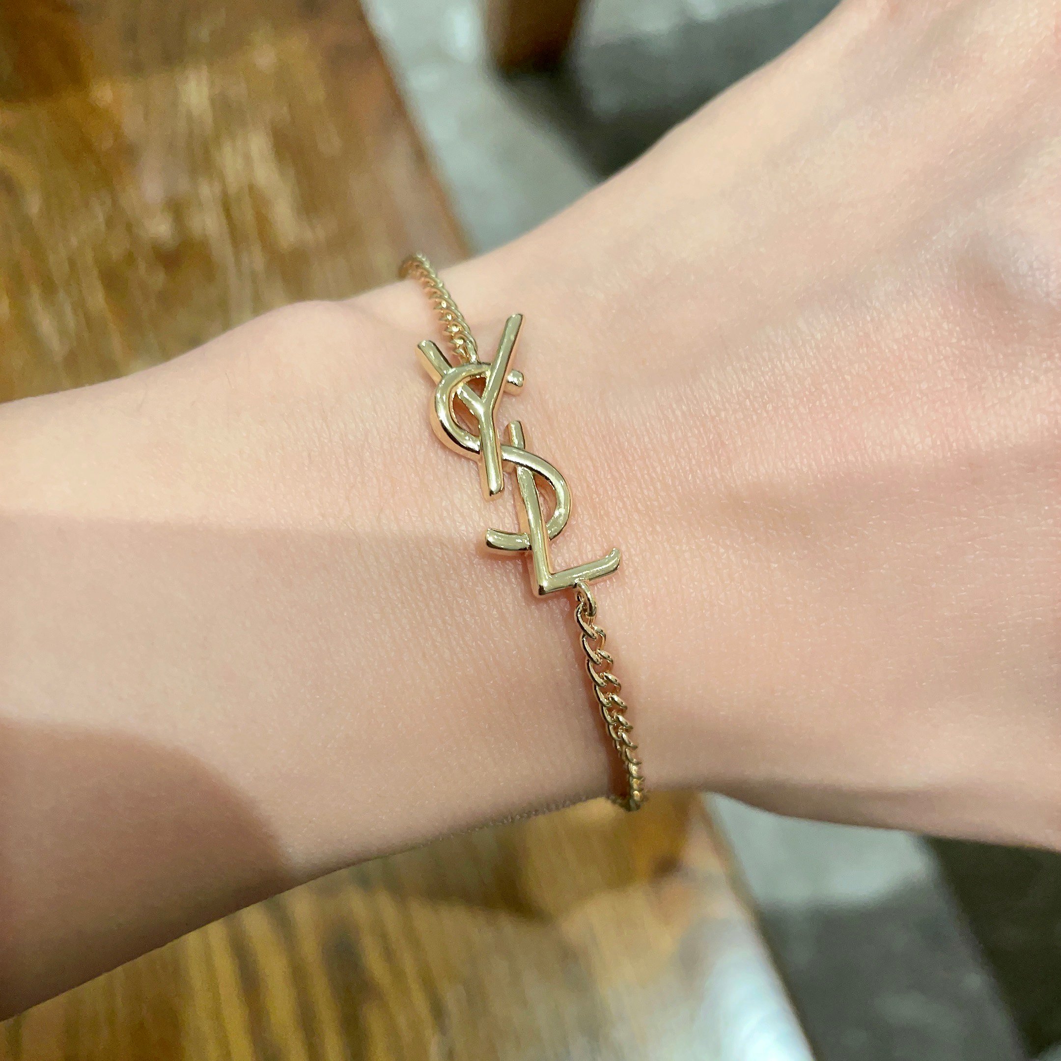 Saint Laurent Cassandre Monogram bracelet gold-tone metal 19cm adjustable