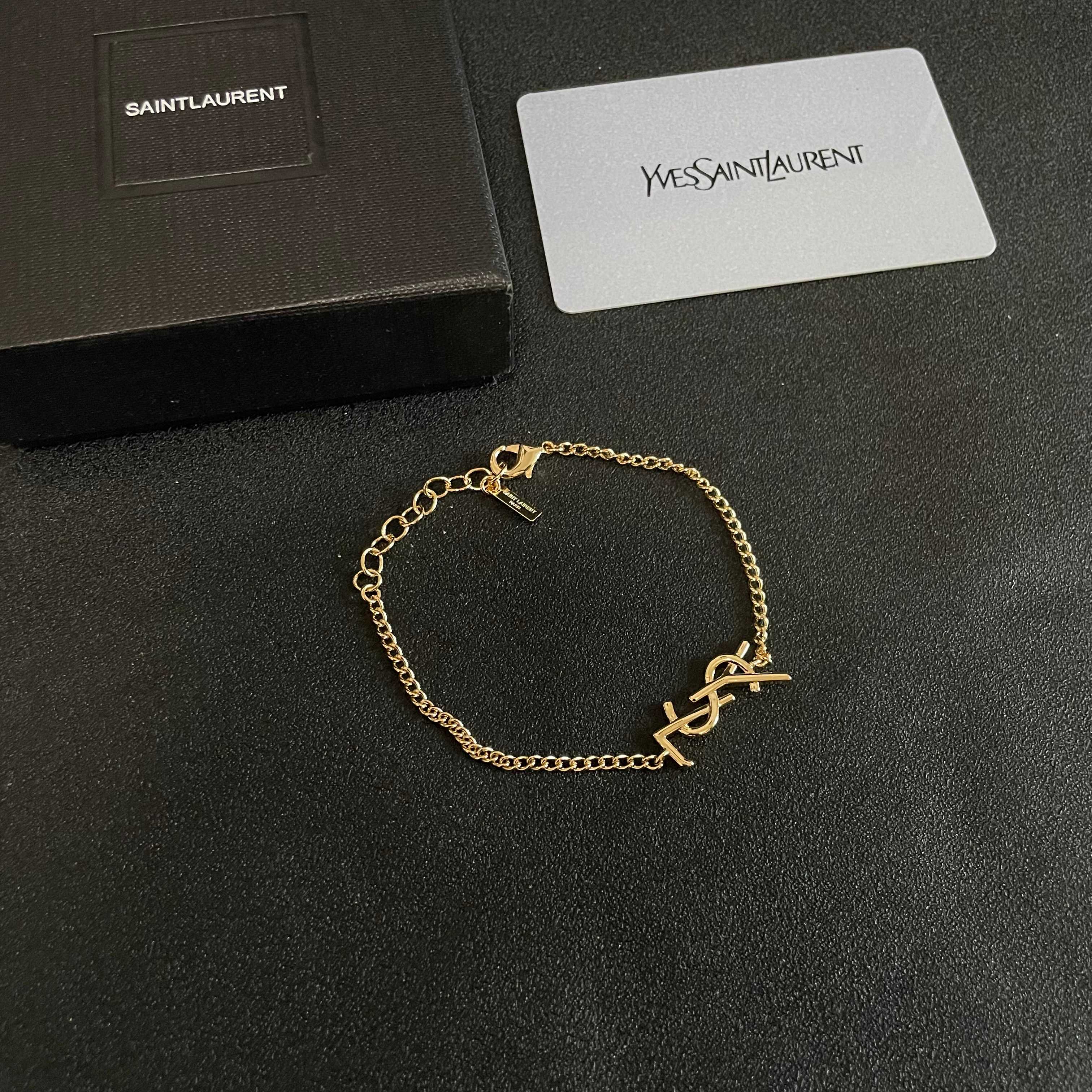 Saint Laurent Cassandre Monogram bracelet gold-tone metal 19cm adjustable