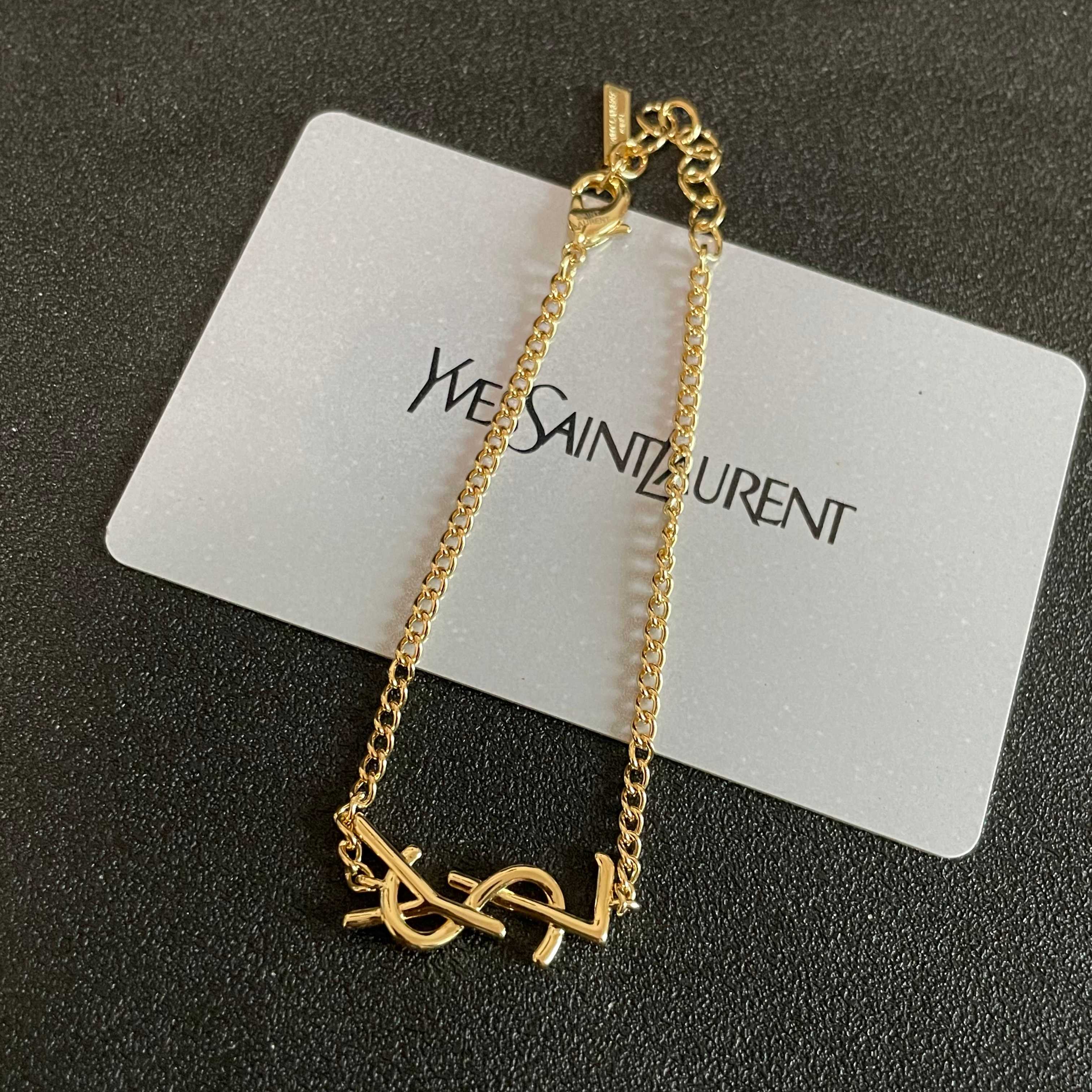 Saint Laurent Cassandre Monogram bracelet gold-tone metal 19cm adjustable
