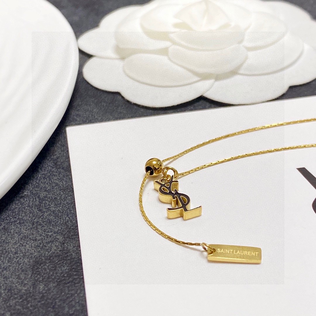 Saint Laurent Cassandre YSL Logo Lariat necklace gold-tone metal 45cm with 5cm extender