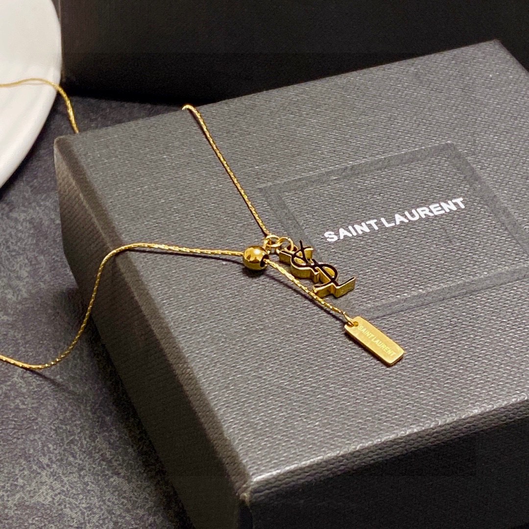 Saint Laurent Cassandre YSL Logo Lariat necklace gold-tone metal 45cm with 5cm extender