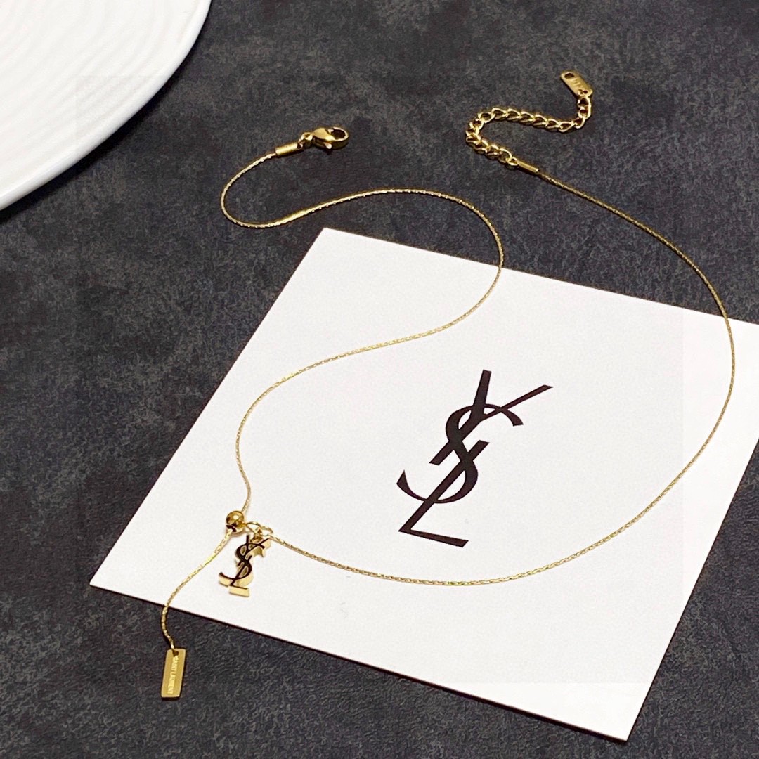 Saint Laurent Cassandre YSL Logo Lariat necklace gold-tone metal 45cm with 5cm extender