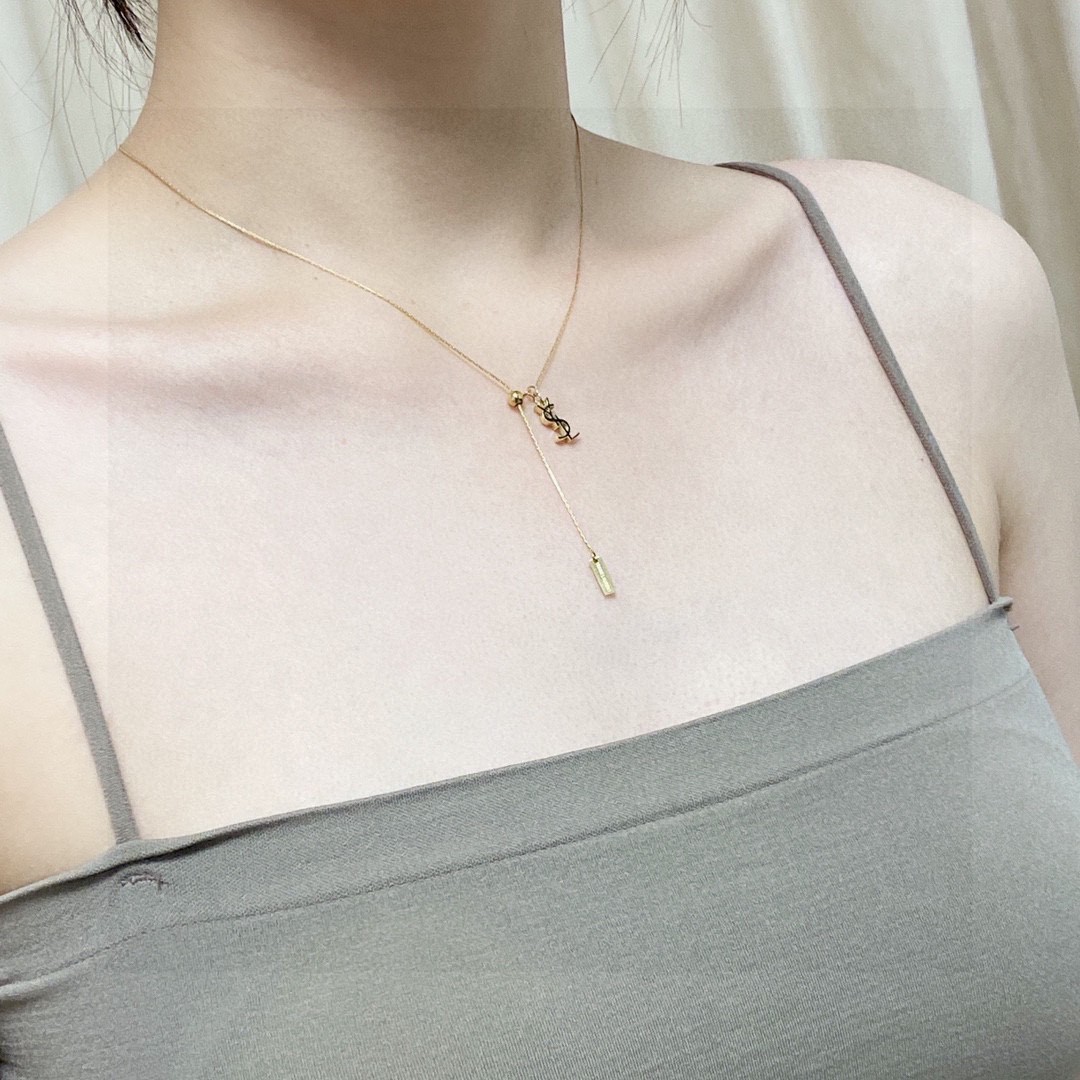 Saint Laurent Cassandre YSL Logo Lariat necklace gold-tone metal 45cm with 5cm extender