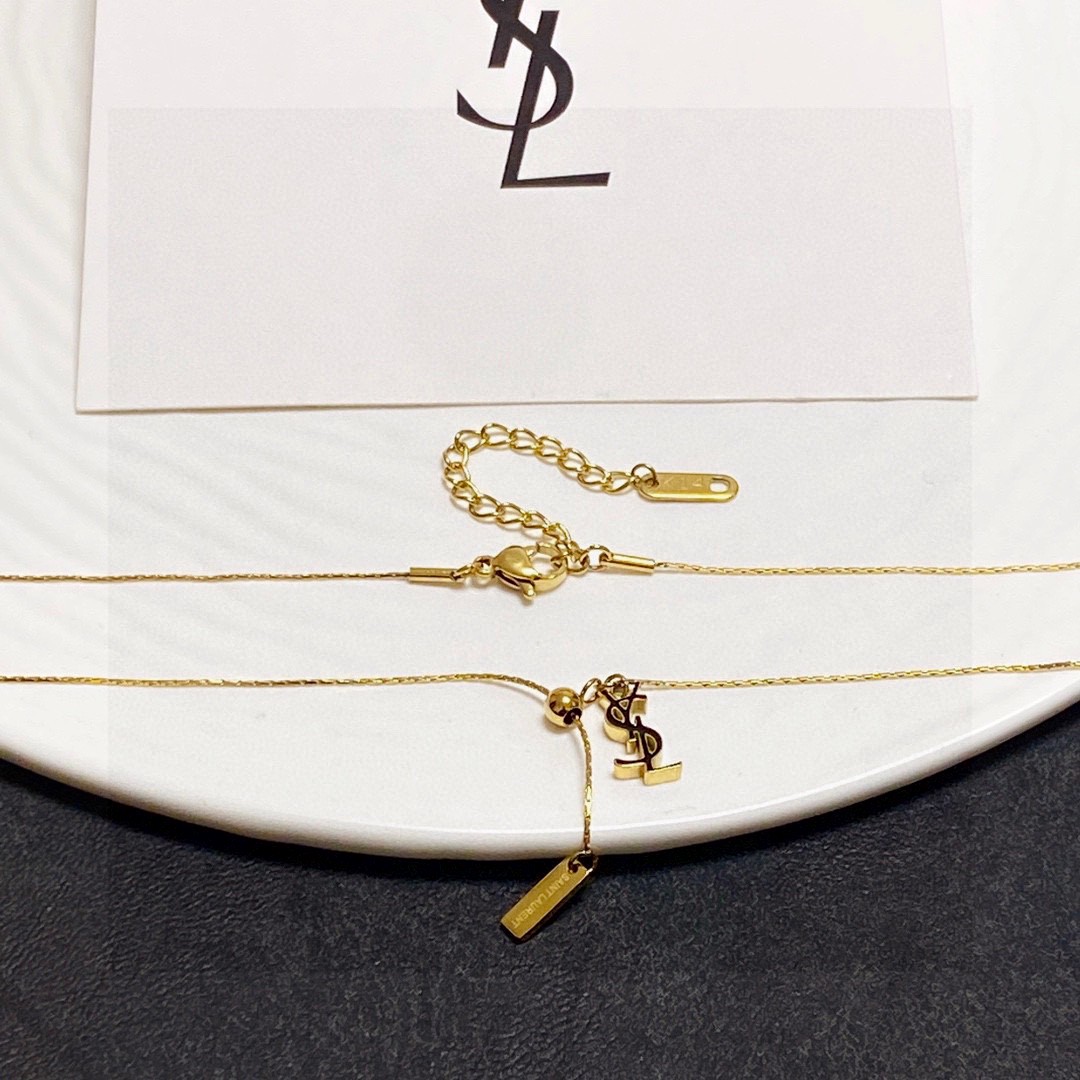 Saint Laurent Cassandre YSL Logo Lariat necklace gold-tone metal 45cm with 5cm extender
