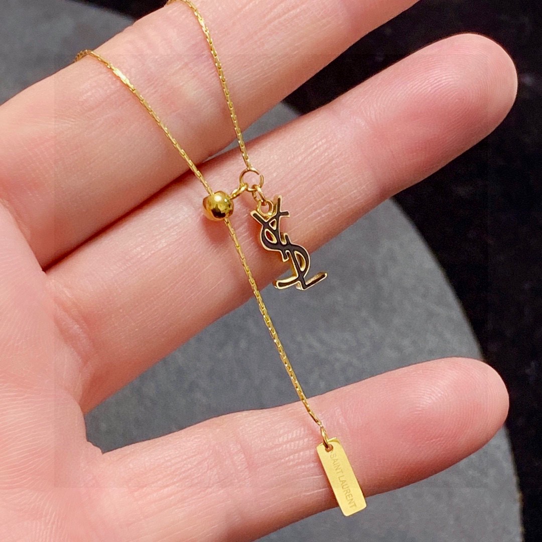 Saint Laurent Cassandre YSL Logo Lariat necklace gold-tone metal 45cm with 5cm extender