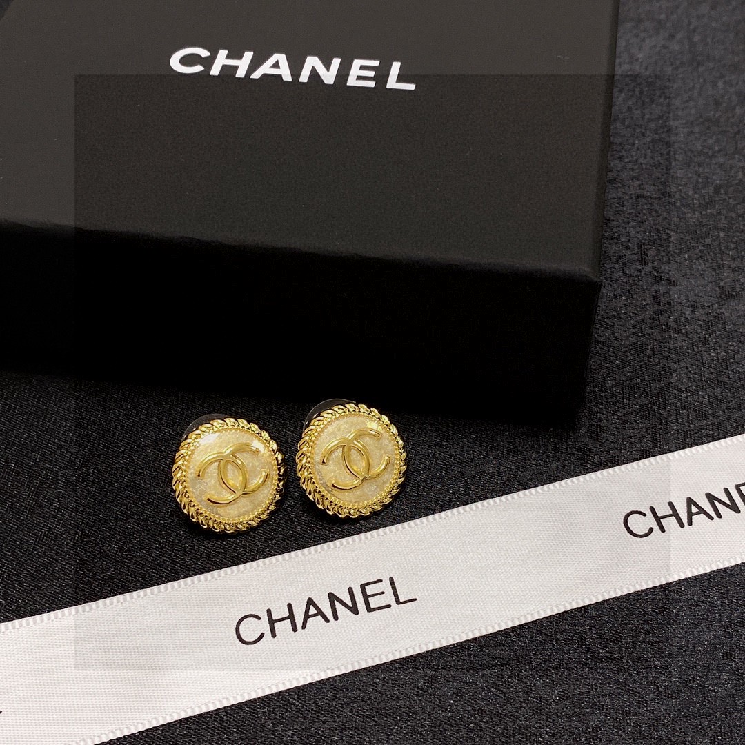 Chanel CC Logo Round Rope Edge Stud Earrings earrings Gold-tone metal with two variants one with black enamel center one with glittered gold-tone resin center 1 8cm diameter