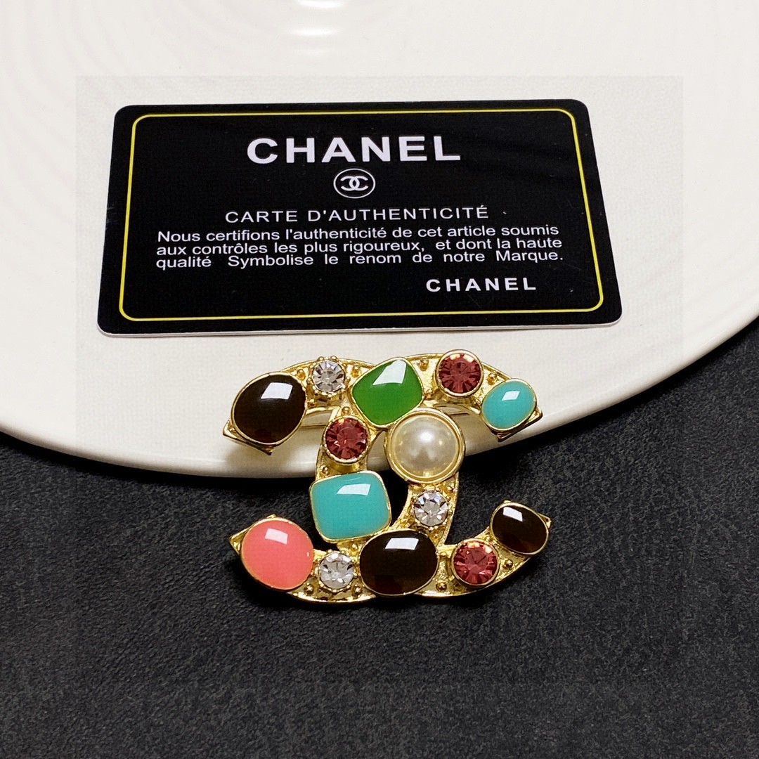 Chanel CC Logo Multicolor Gripoix Brooch brooch Gold-tone metal with multicolor resin stones black green turquoise coral pink ruby red clear crystals and white faux pearl 3 5cm width