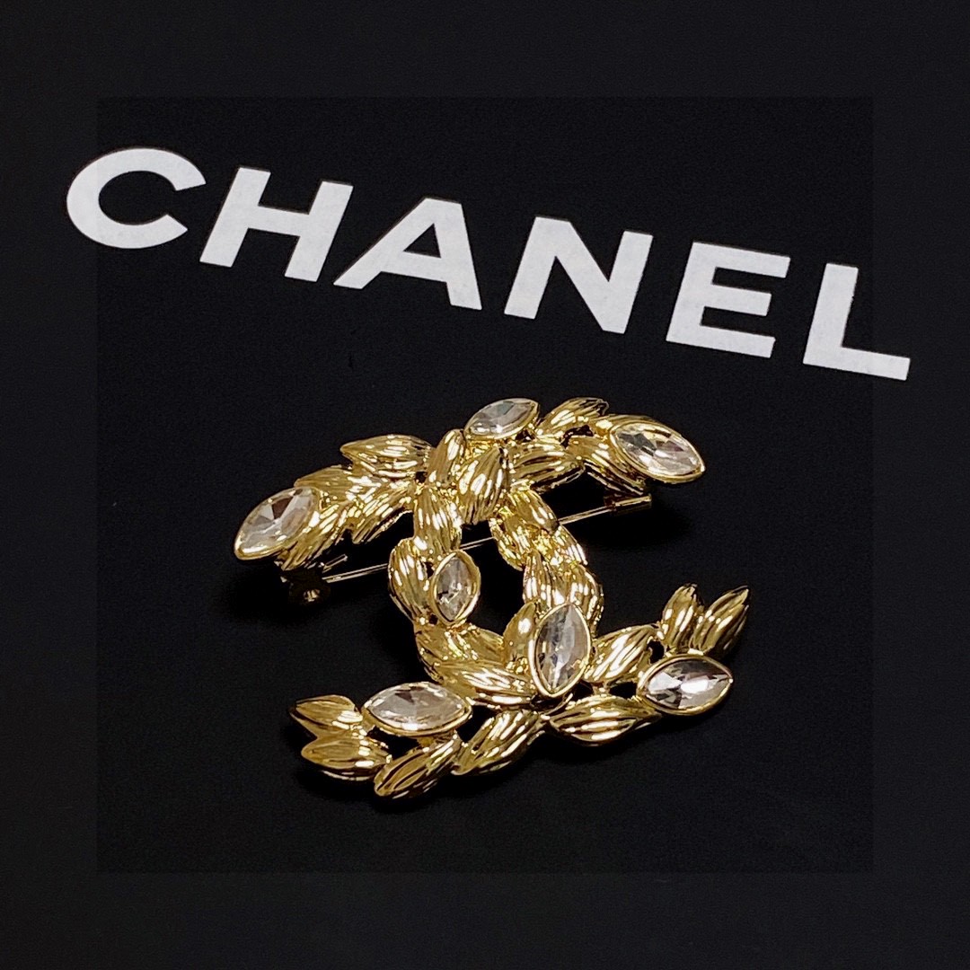 Chanel CC Wheat Leaf Crystal Brooch brooch Gold-tone metal with clear faceted marquise-cut crystals Approximately 4 5cm x 3