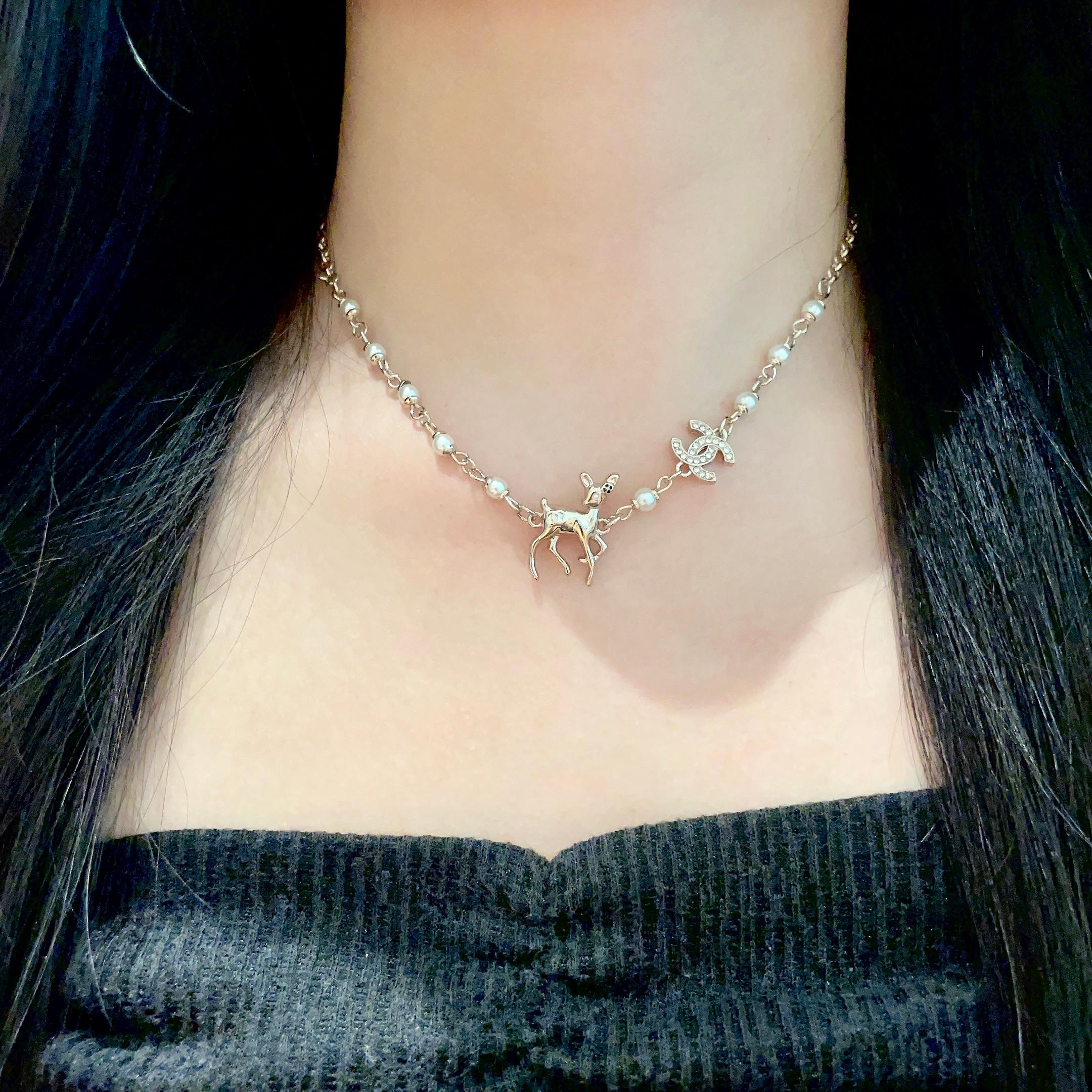 Chanel CC Logo Deer Charm Pearl Choker necklace light gold metal white faux pearl clear crystal 40cm